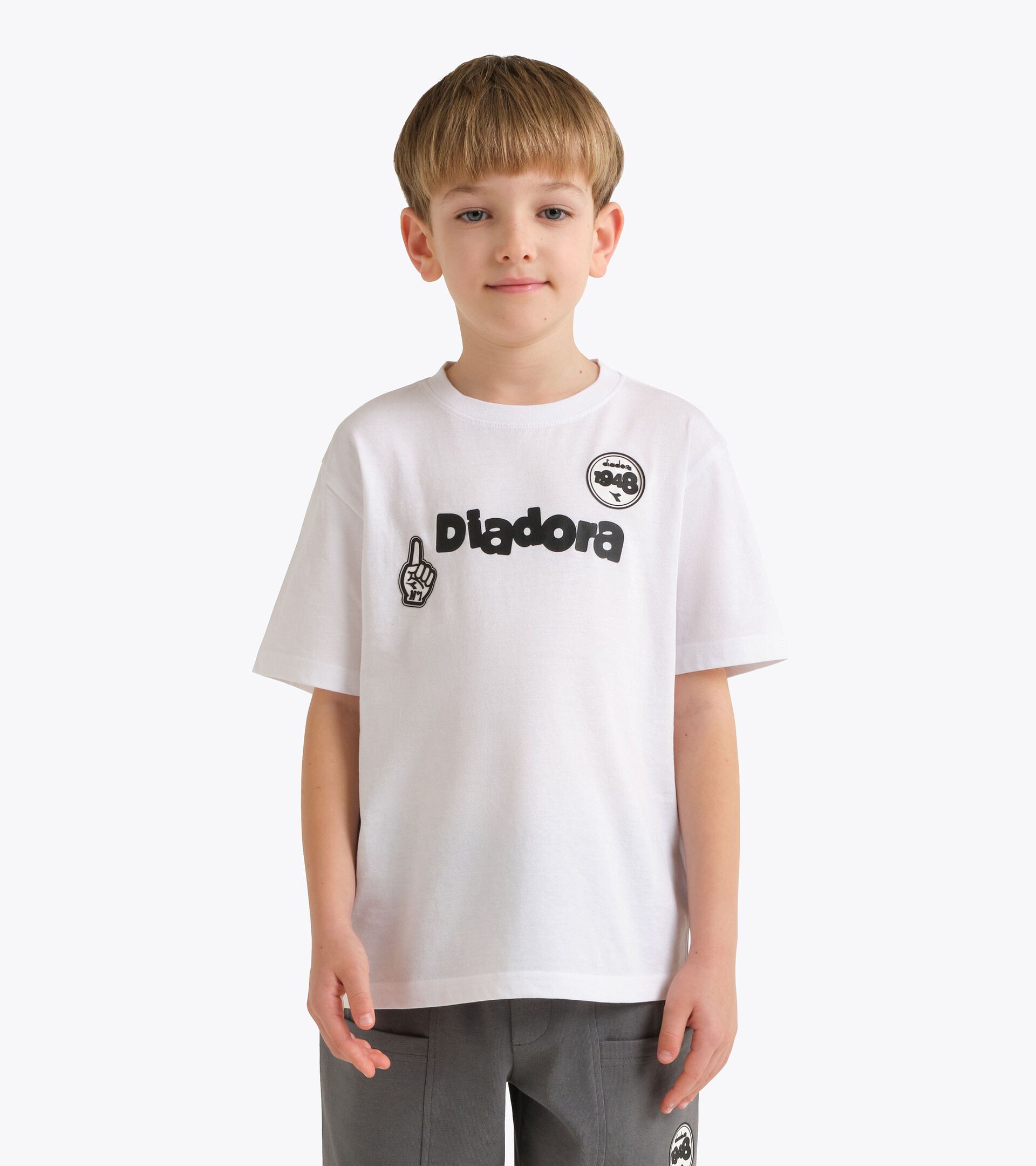 T-Shirt aus Baumwolle - Jungen
 JB. T-SHIRT SS ESS. SPORTS BL STRAHLEND WEISSE - Diadora