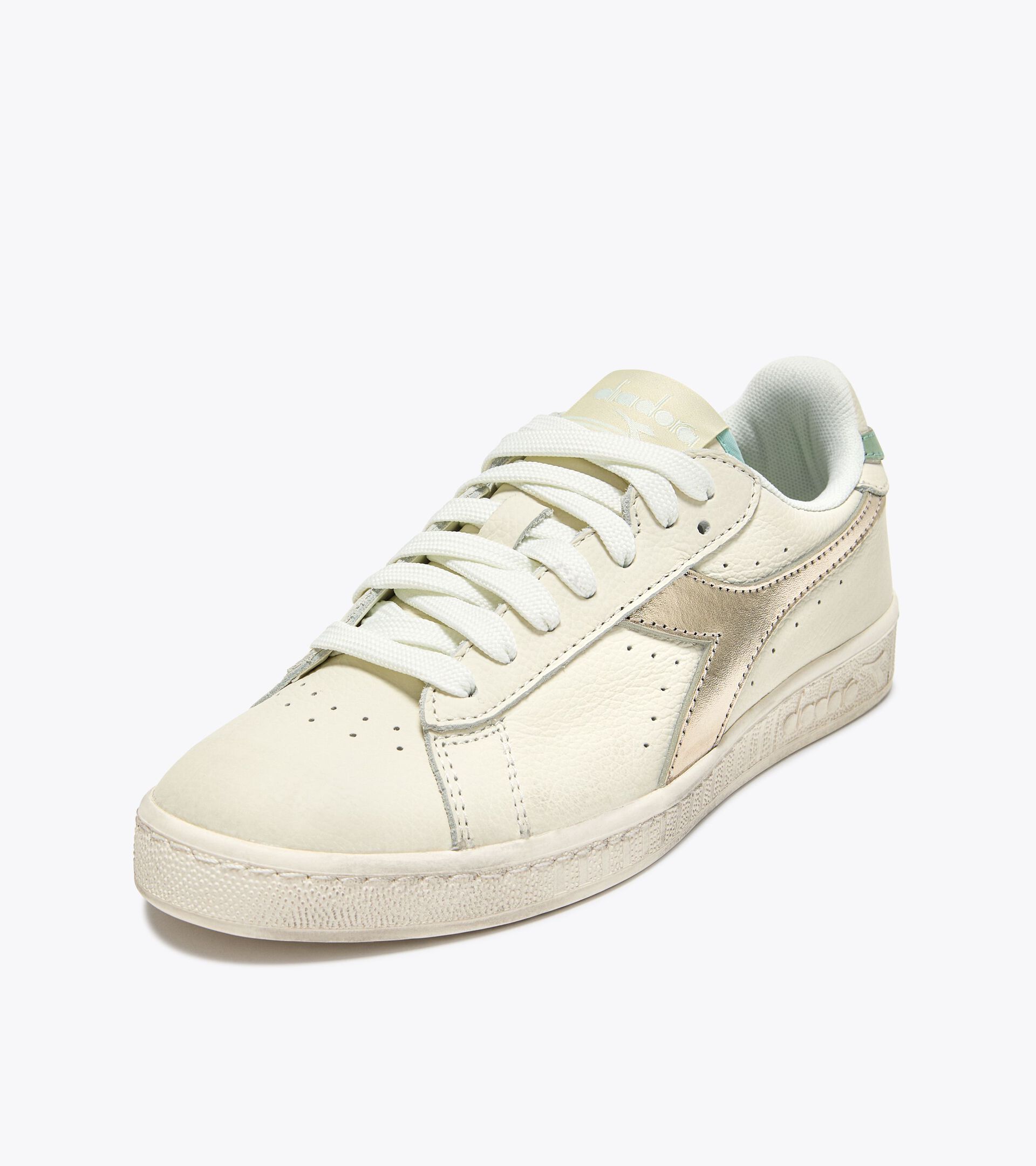 Zapatilla deportiva de piel - Mujer 
 GAME L LOW WAXED METAL WN BLANCO/BEIGE ROCIO HELADO - Diadora