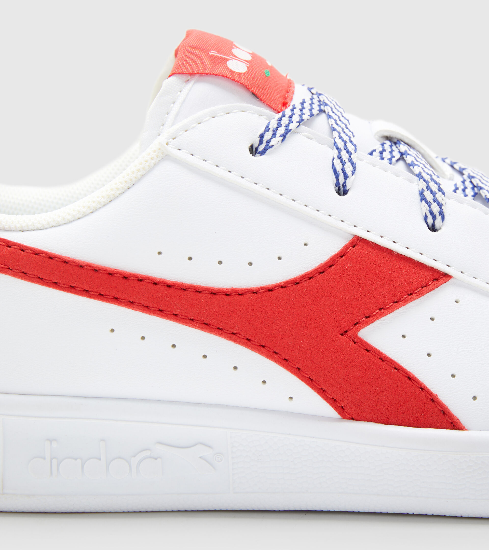 Zapatilla deportiva - Niños 8-16 años GAME P ACE GS BLANCO/ROJO LAVA FUNDIDA - Diadora