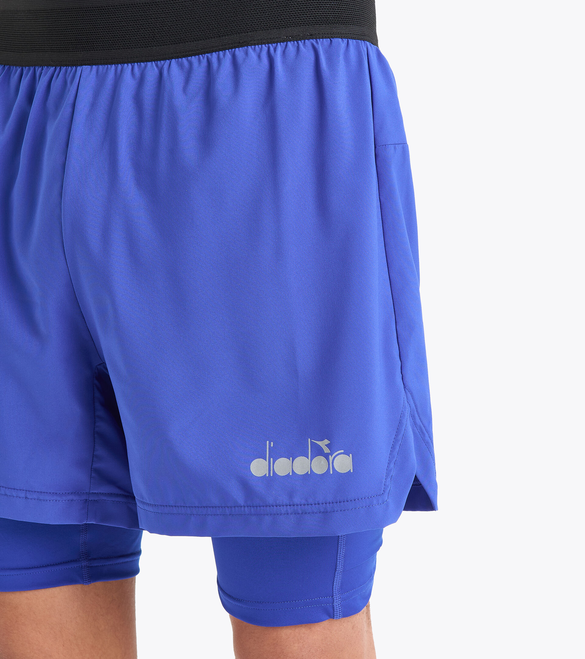 Pantalones cortos de running - Hombre DOUBLE LAYER BERMUDA BE ONE AZUL NAVEGAR EN LA WEB - Diadora