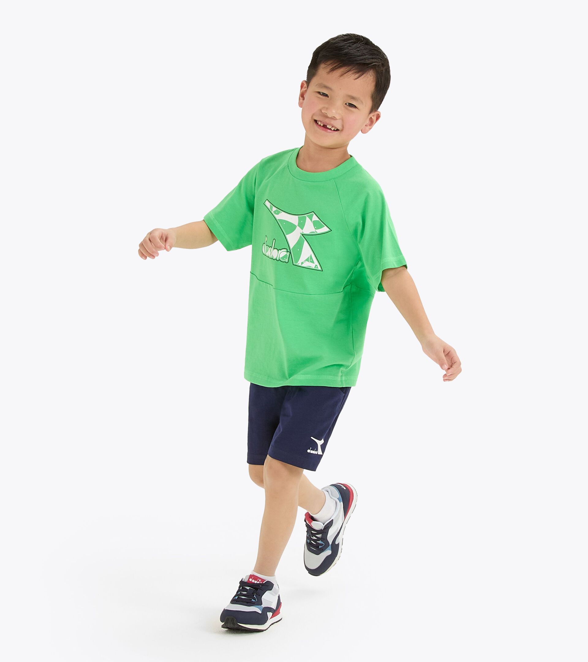 Conjunto deportivo - Camiseta y pantalones cortos - Niños y adolescentes
 JB. SET SS RIDDLE VERDE VENENO - Diadora