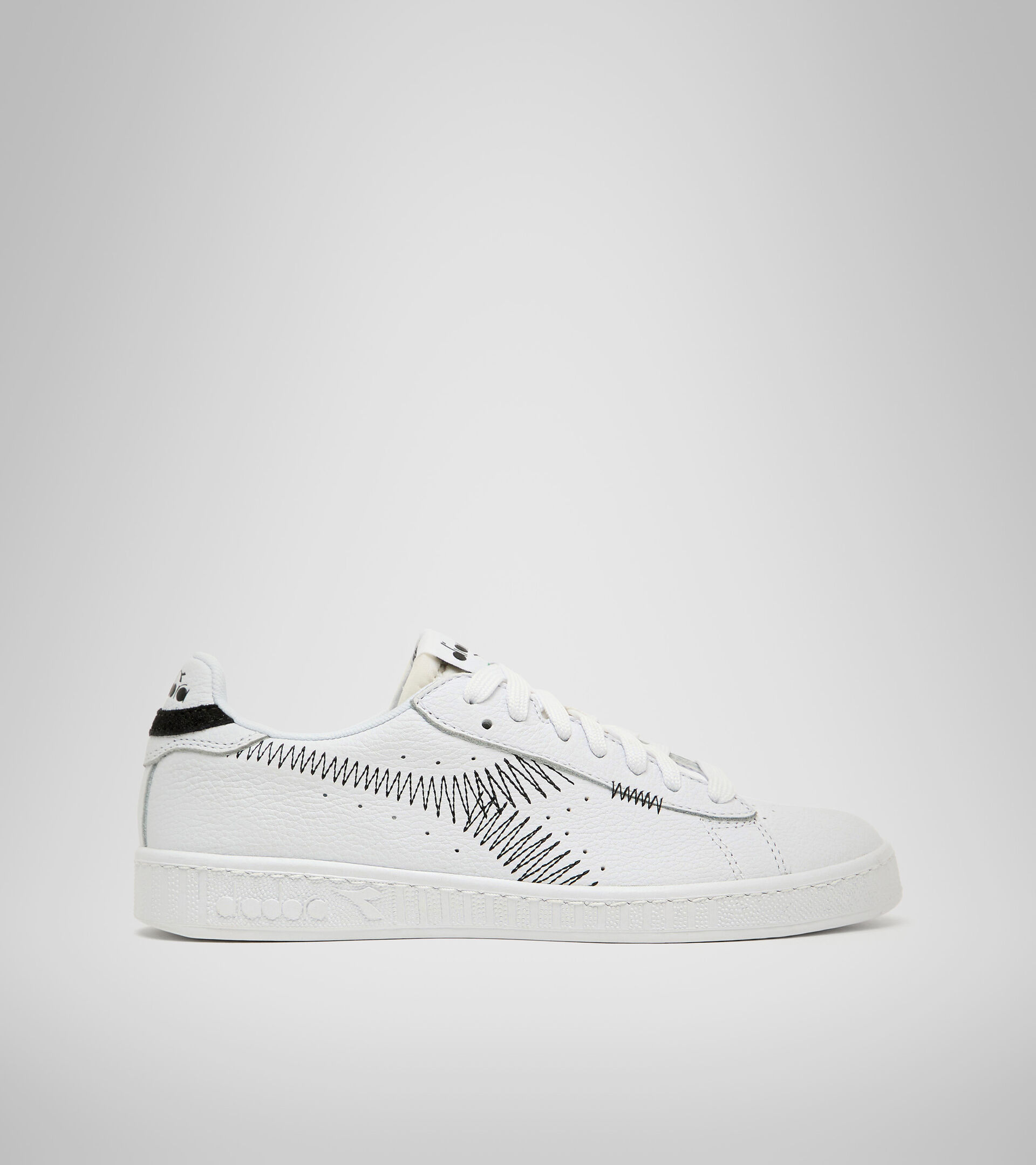 Sports shoe - Women GAME L LOW ZIG ZAG WN OPTICAL WHITE/BLACK - Diadora