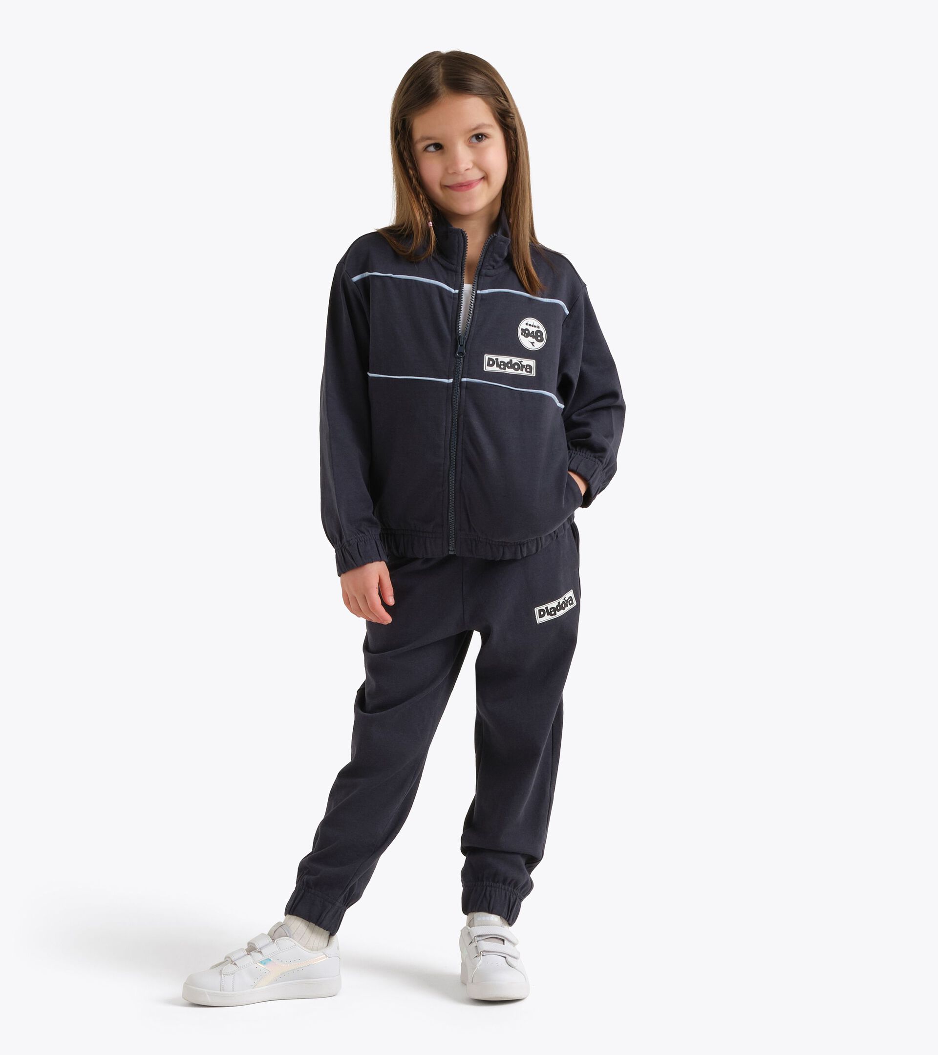 Surv&ecirc;tement de sport - Ado gar&ccedil;on et fille
 JU. TRACKSUIT FZ ESS. SPORTS  (HJ) BLEU NUITS - Diadora