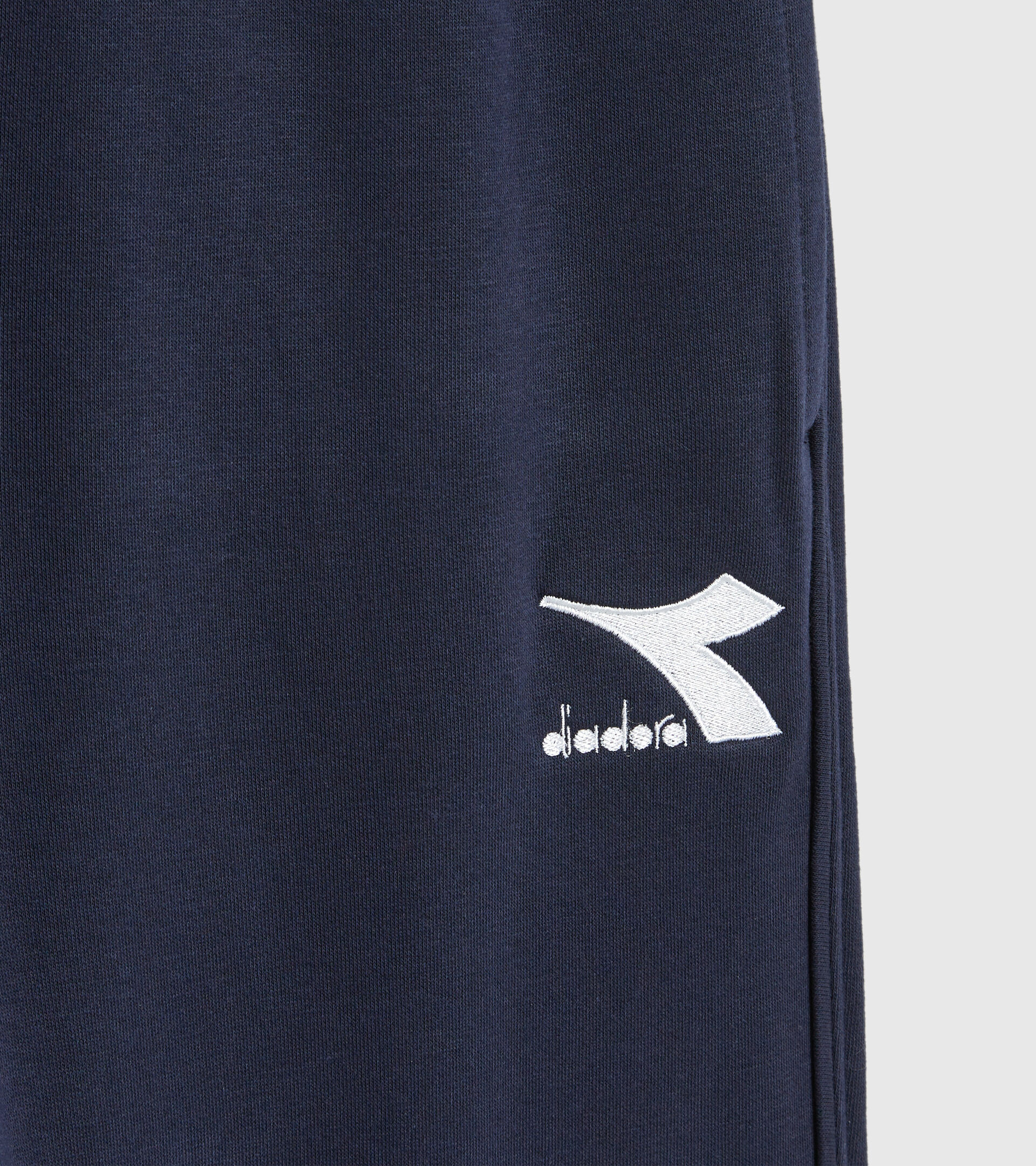Sports trousers - Men PANTS CUFF CORE CLASSIC NAVY - Diadora