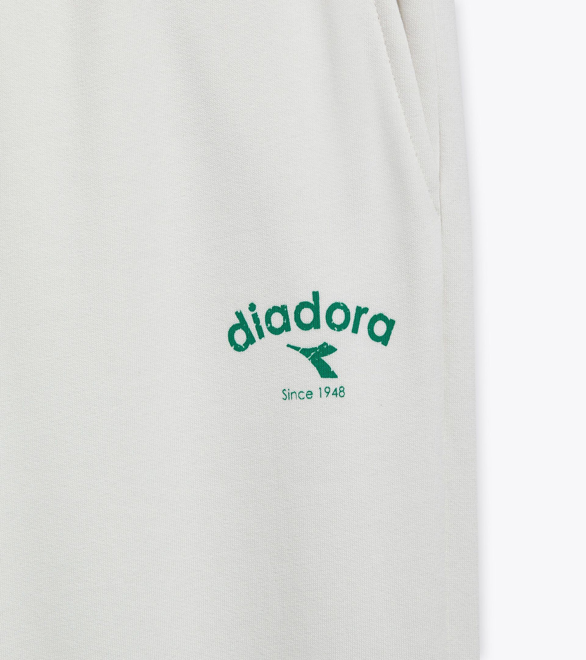 Pantaloni sportivi - Gender Neutral PANTS ATHL. LOGO BIANCO LATTE - Diadora