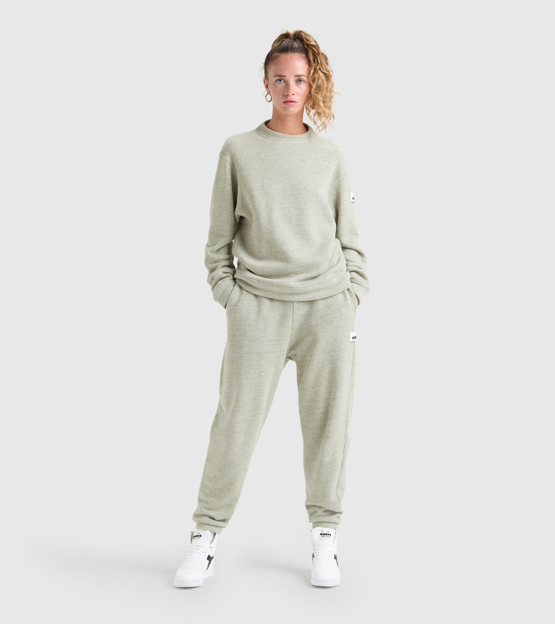 Sports trousers - Women L. PANT MANIFESTO 2030 DESERT SAGE MELANGE - Diadora