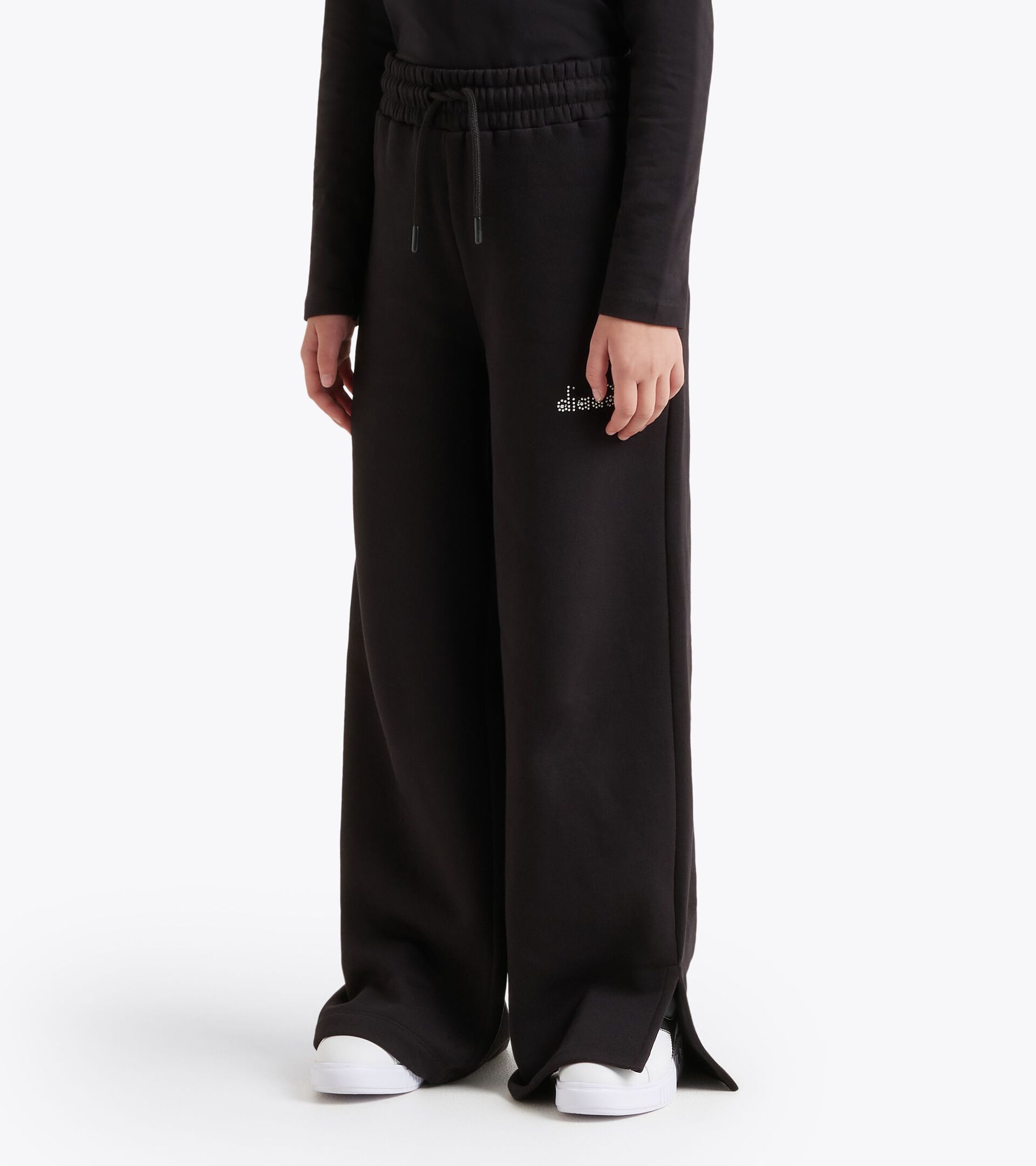 Sporthose mit ausgestelltem Bein - Mädchen JG. FLARE PANTS RHINESTONE SCHWARZ - Diadora