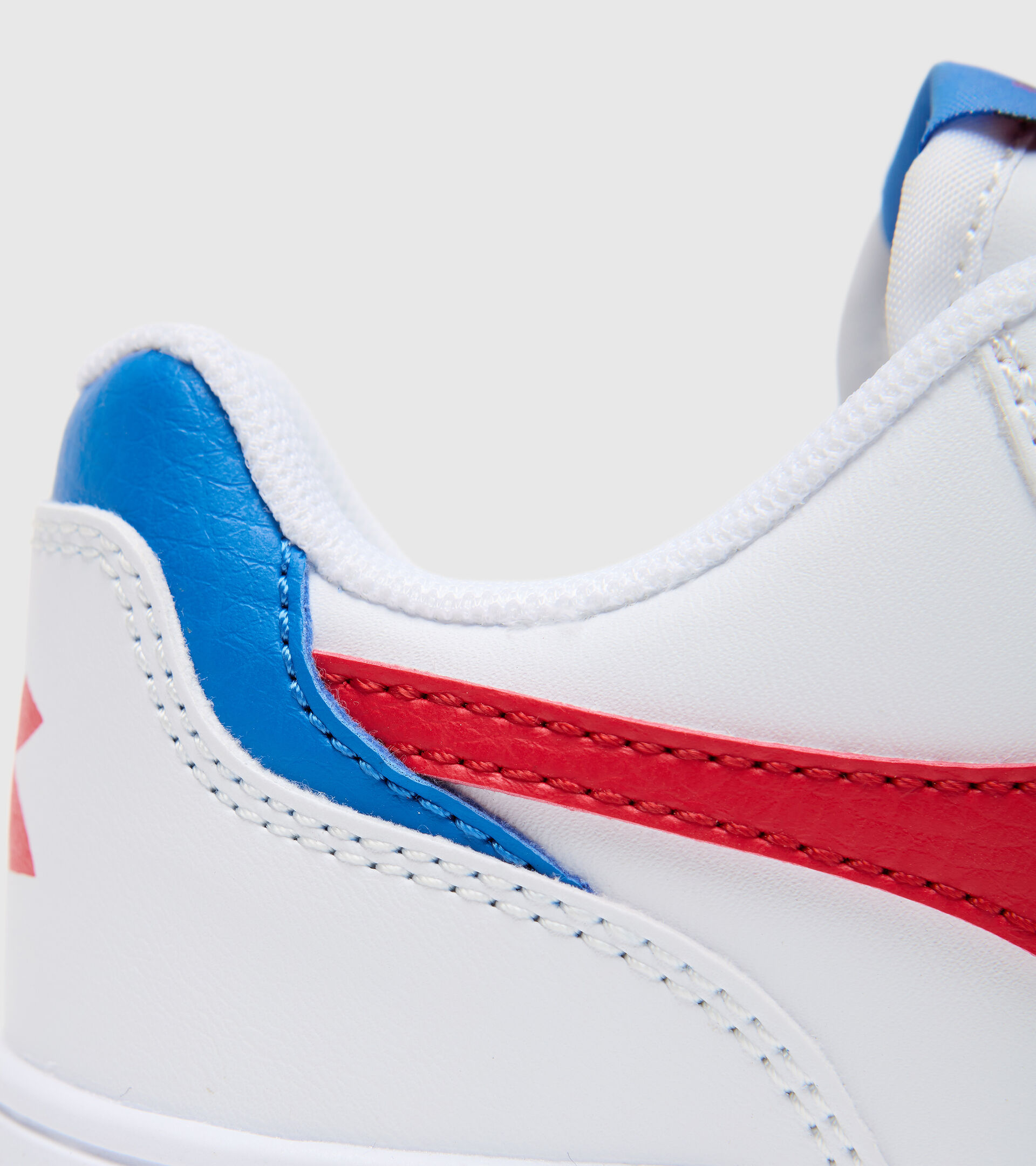 null RAPTOR LOW PS BIANCO/TOMATO RED - Diadora
