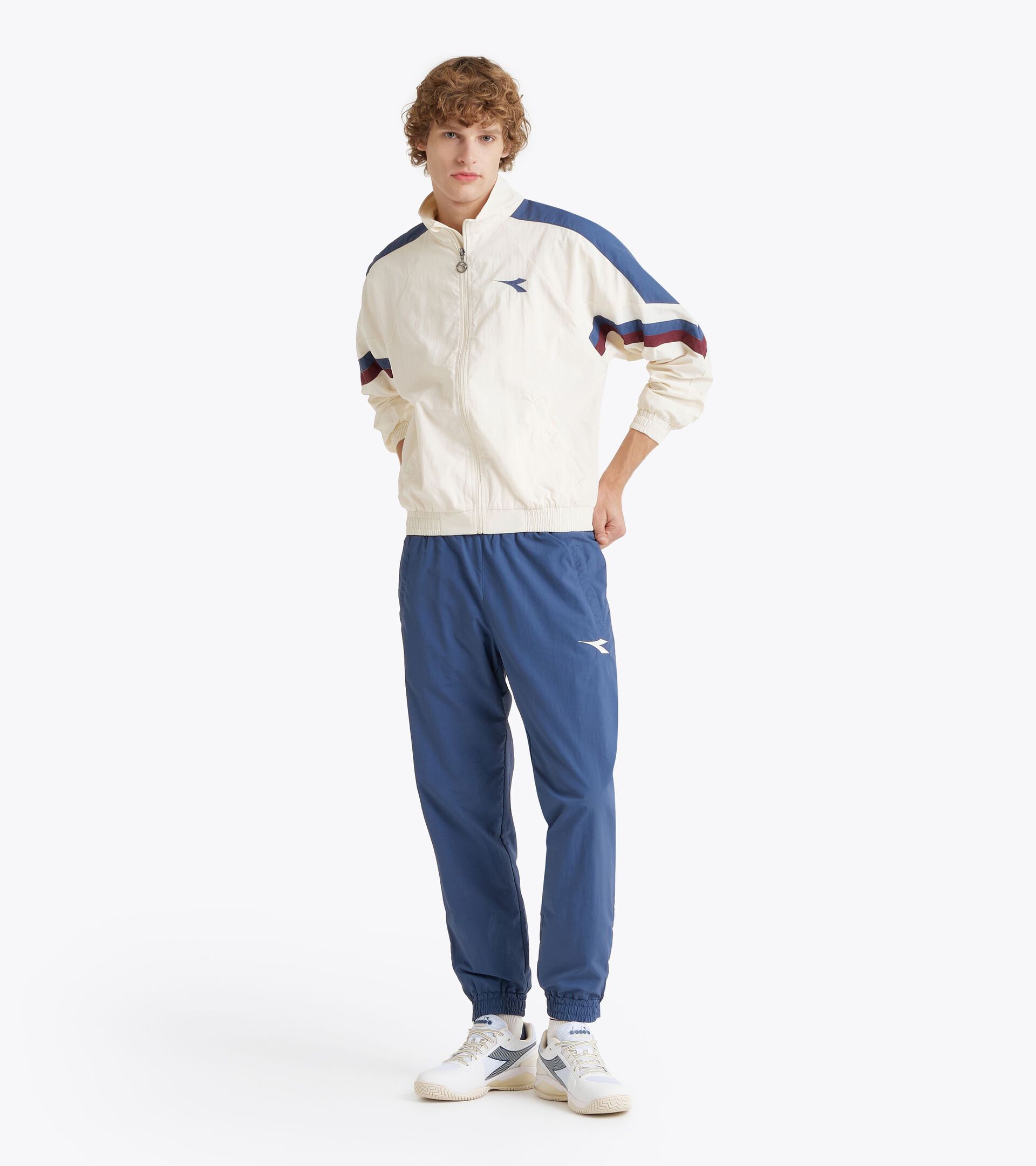 Surv&ecirc;tement de tennis en taslan - Comp&eacute;tition - Pour tous les genres U. TRACK PANTS MATCH BLEU INSIGNES - Diadora