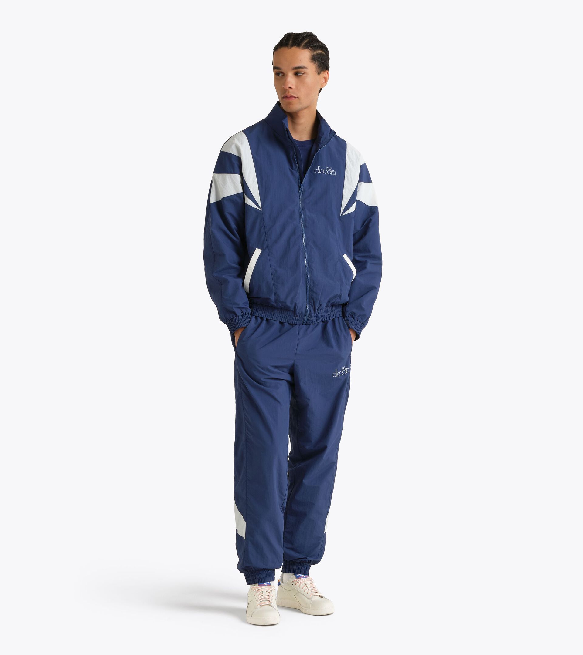 Ch&aacute;ndal de ripstop - Para todos los g&eacute;neros
 TRACKSUIT LOGO EXC. I AZUL MARINO PEONIA - Diadora