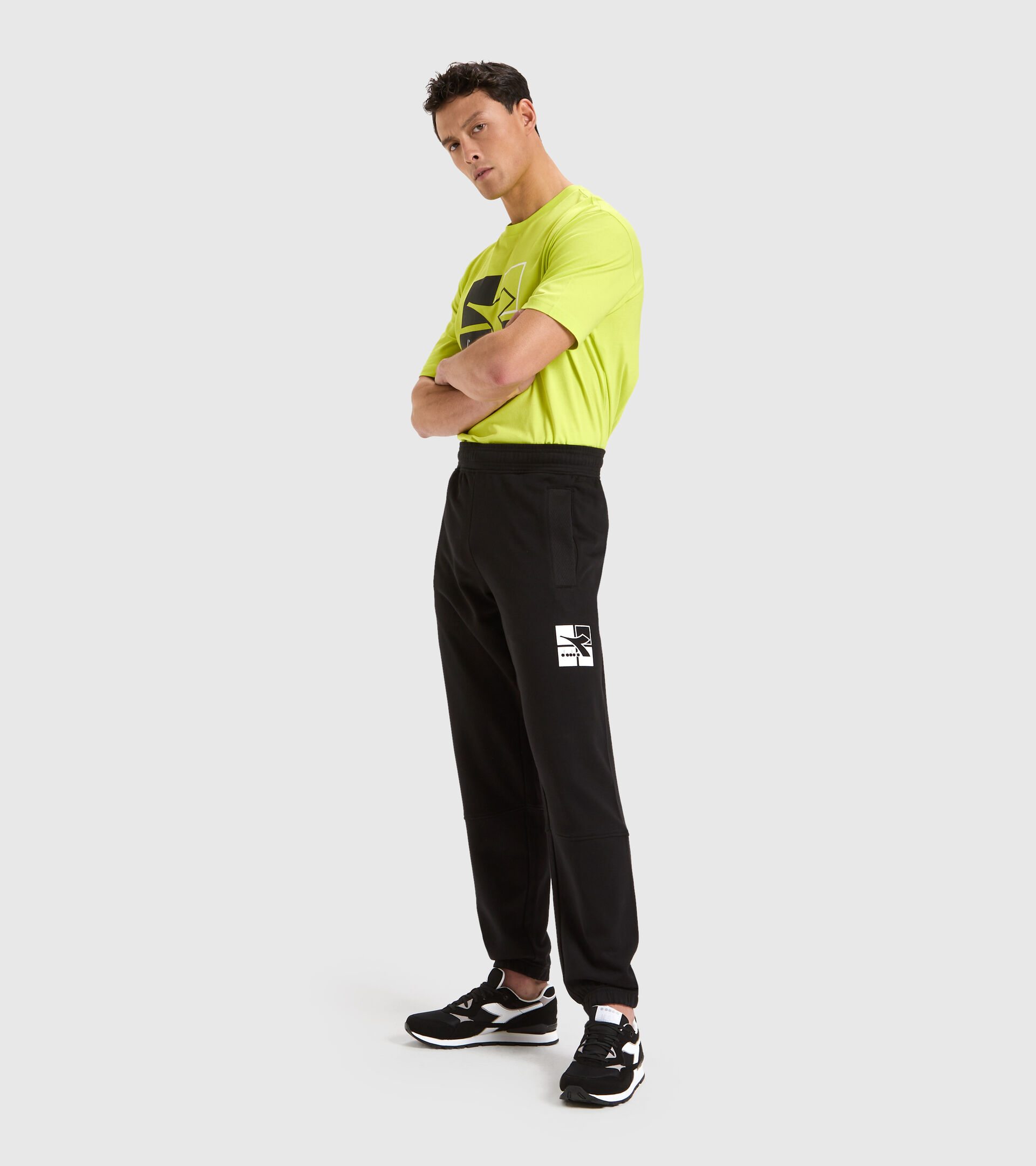 Sports trousers - Men CUFF PANT WEAVE BLACK - Diadora