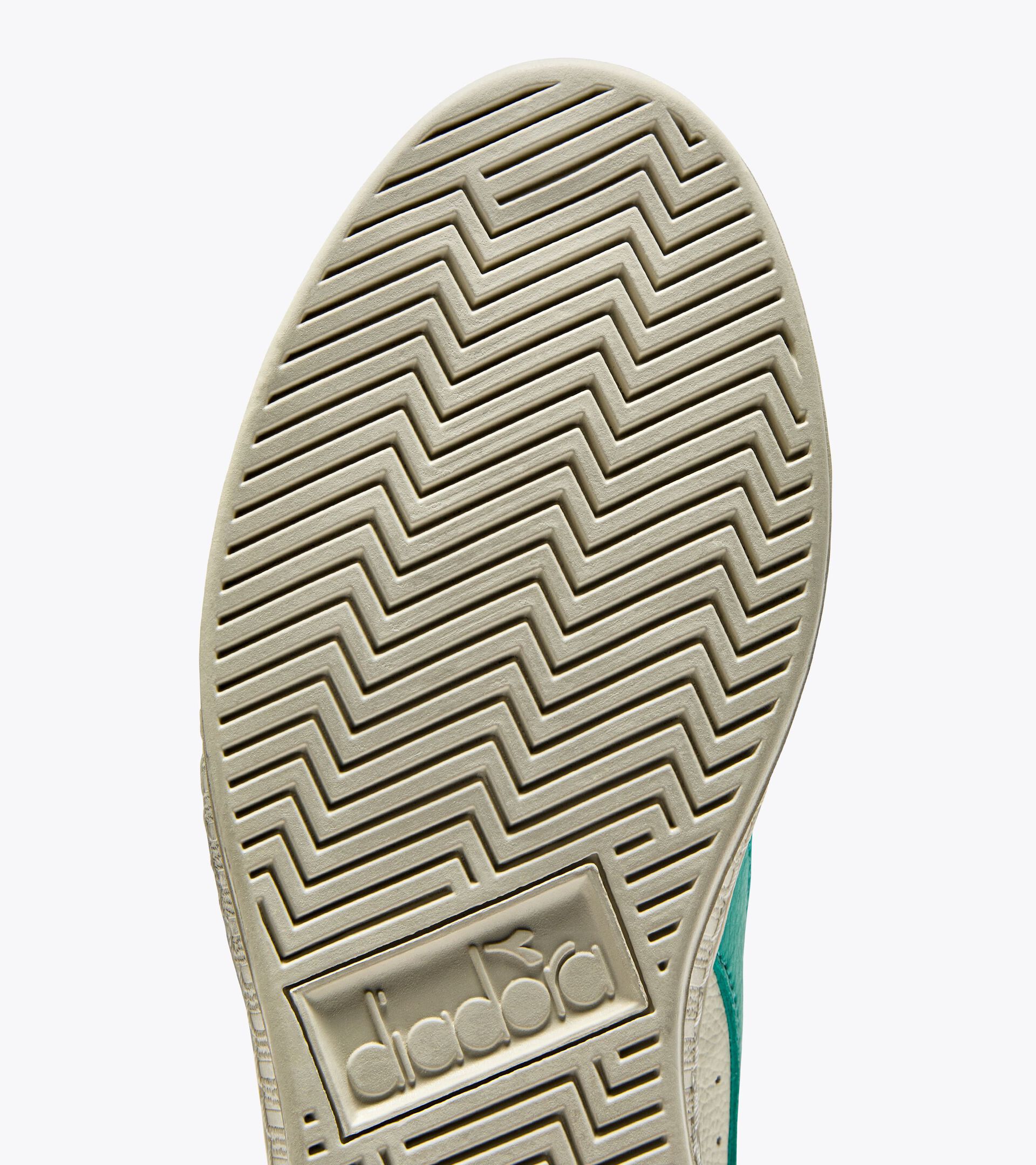 Sporty sneakers - All-Gender GAME L LOW WAXED SPECTRA GREEN - Diadora