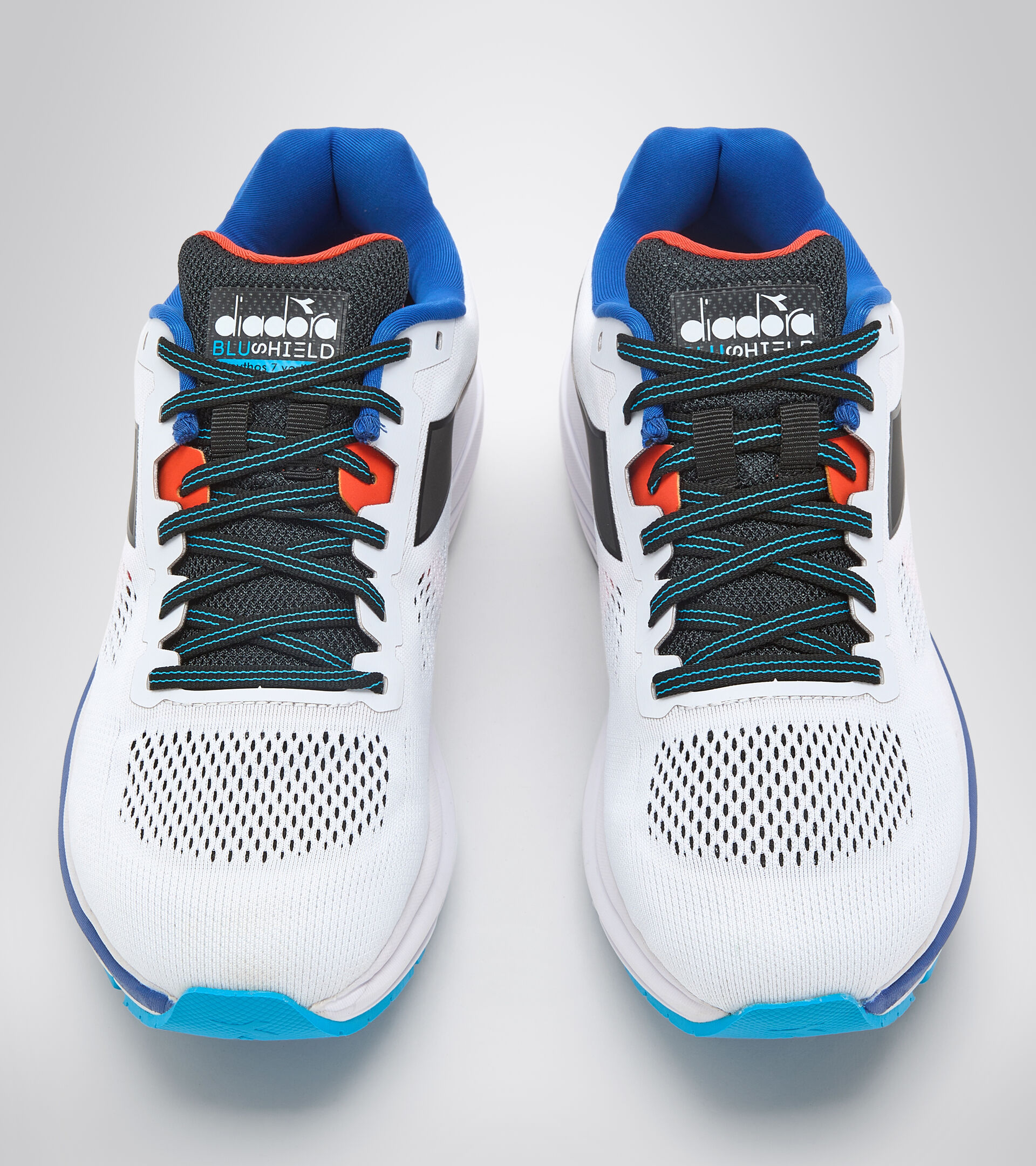 Running shoes - Men MYTHOS BLUSHIELD 7 VORTICE WHITE/BLACK/TURKISH SEA - Diadora