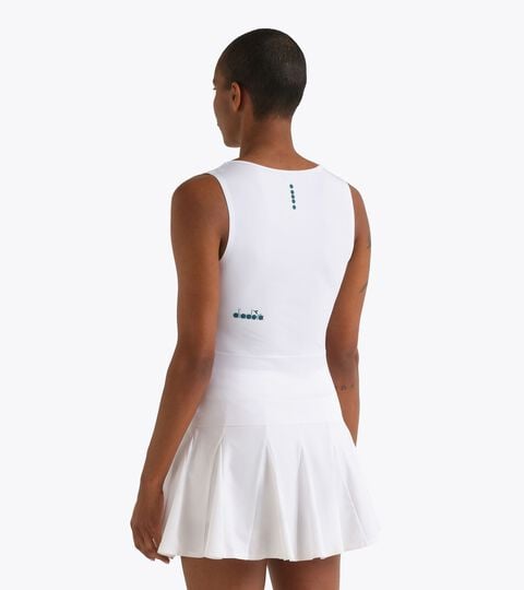 Top t&eacute;cnico con tecnolog&iacute;a FIBRAZERO - Competici&oacute;n - Mujer L. TANK MATCH FIBRAZERO BLANCO VIVO - Diadora