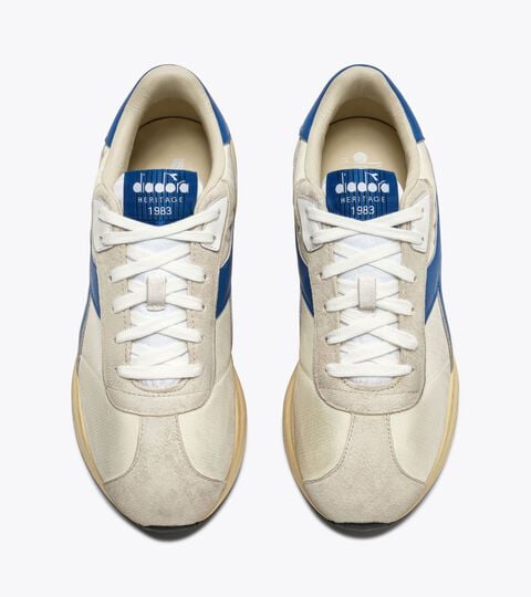 Sneakers Heritage en cuir - Couleurs OG - Femme
 MERCURY ELITE SPRINT SW BLANC IMMACULE - Diadora