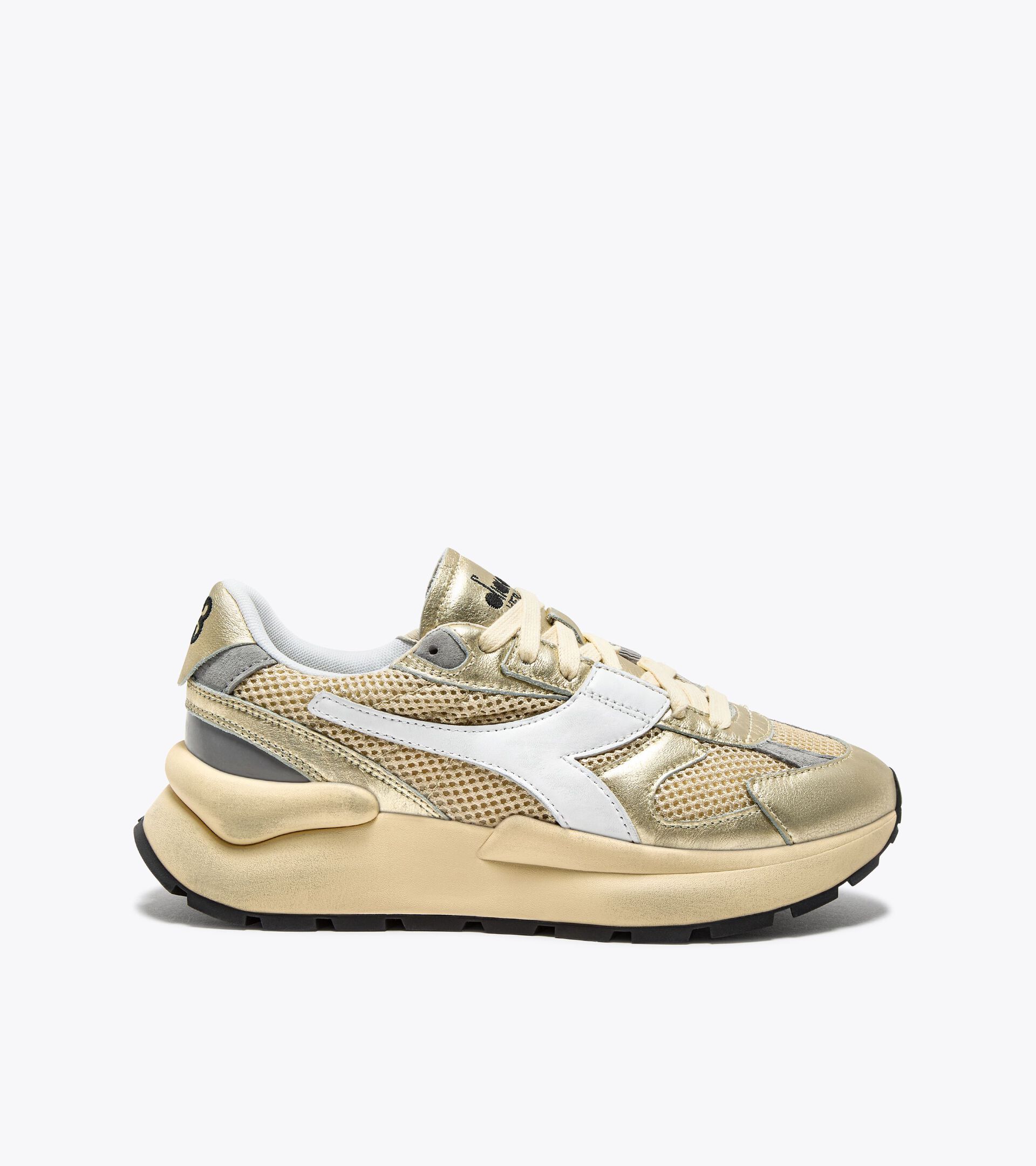 Zapatilla Heritage de piel laminada - Mujer
 MERCURY ELITE LAM USED  WN MANZANILLA - Diadora
