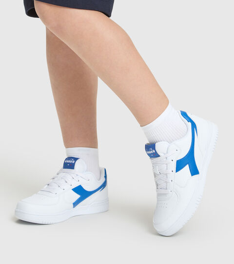 RAPTOR LOW GS, WHITE/IMPERIAL BLUE Sports shoes - Youth 8-16 years RAPTOR LOW GS WHITE/IMPERIAL BLUE - Diadora