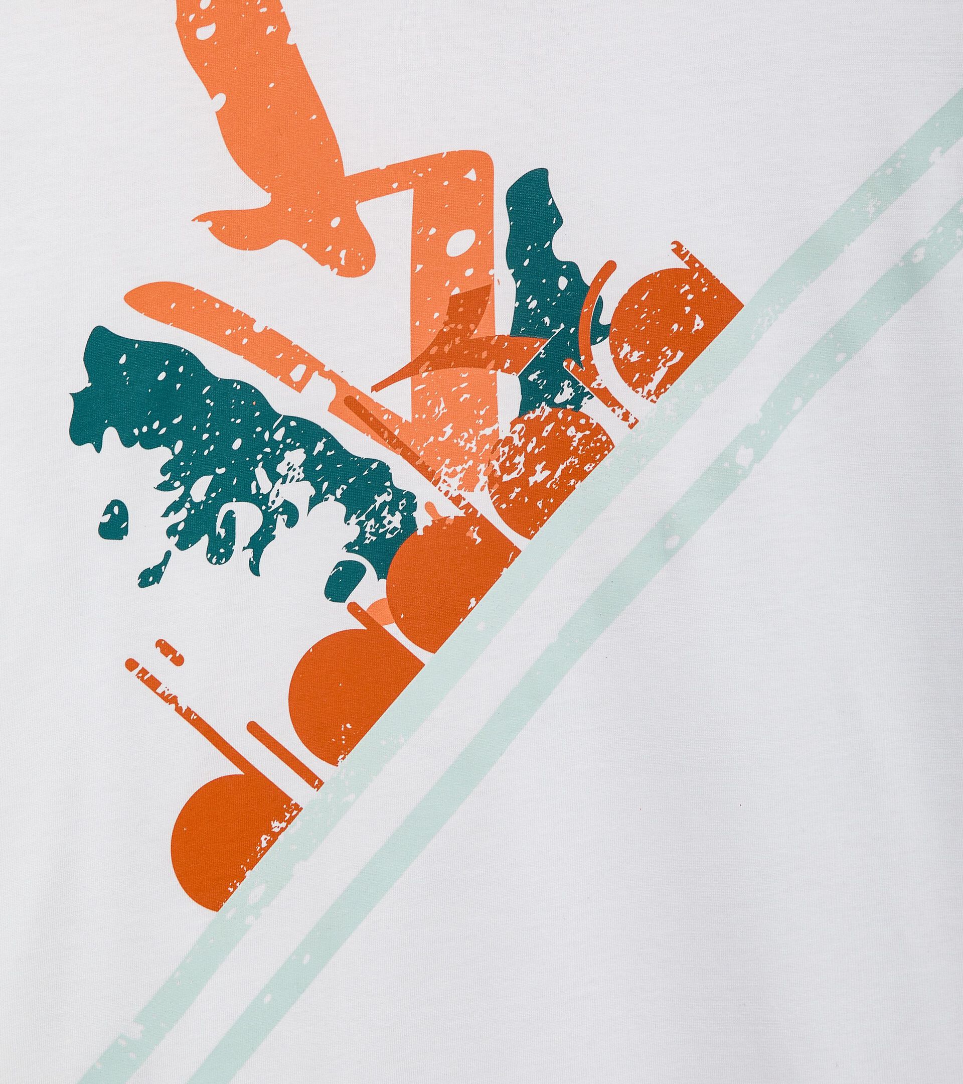 Camiseta deportiva estilo años 90 - Made in Italy - Hombre T-SHIRT SS TENNIS 90 NARANJA ZANAHORIA - Diadora