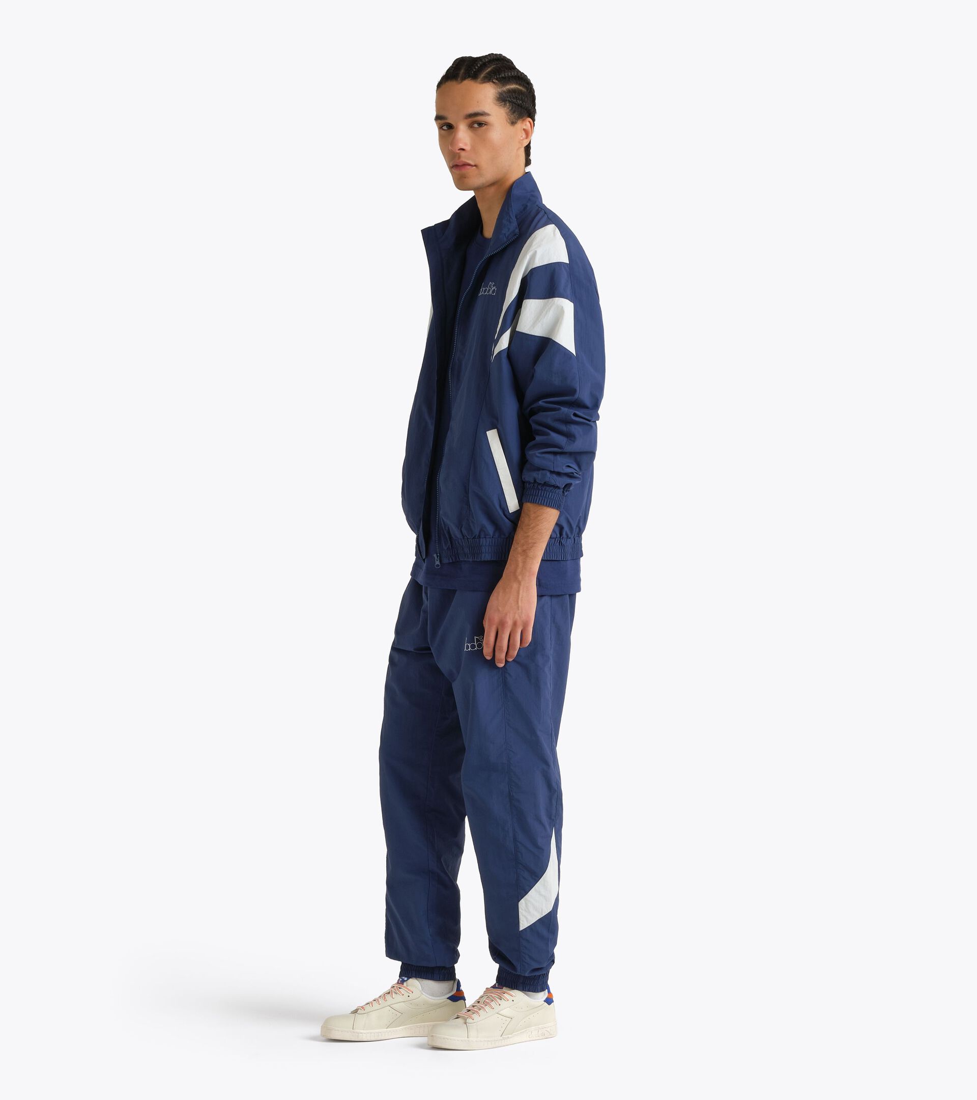 Ch&aacute;ndal de ripstop - Para todos los g&eacute;neros
 TRACKSUIT LOGO EXC. I AZUL MARINO PEONIA - Diadora