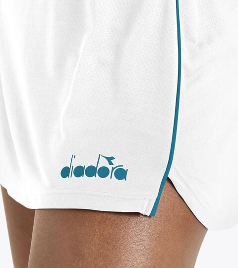 L. SKIRT CORE, OPTICAL WHITE Tennis skirt - Women’s
L. SKIRT CORE OPTICAL WHITE - Diadora