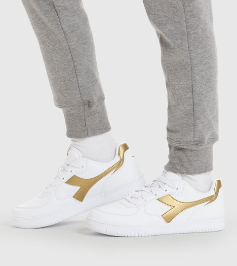 RAPTOR LOW GS, BIANCO/ORO Footwear Sport BAMBINO RAPTOR LOW GS BIANCO/ORO Diadora