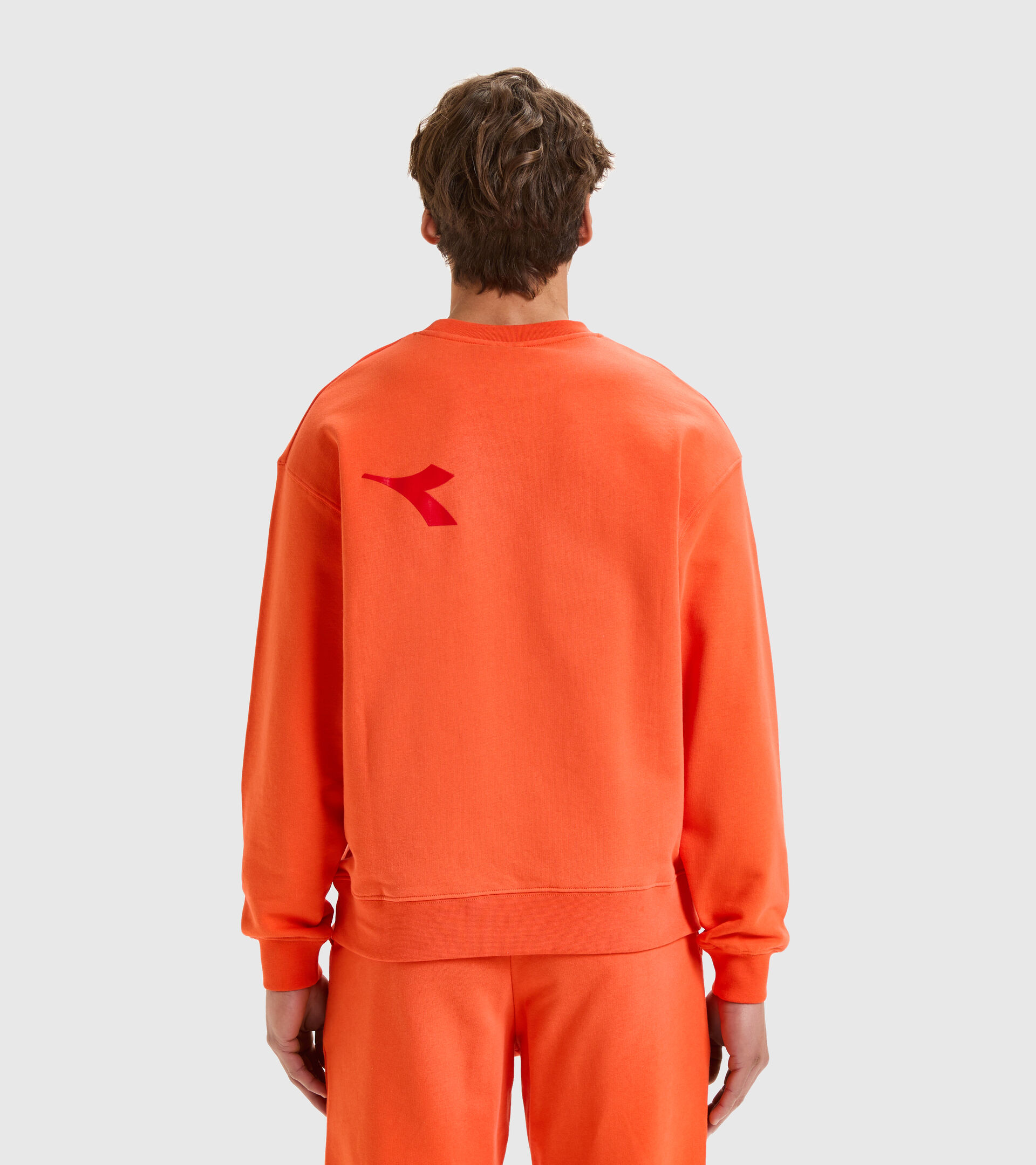 Sweat-shirt ras-de-cou en Coton - Unisexe SWEATSHIRT CREW MANIFESTO ORANGE VERMEIL - Diadora