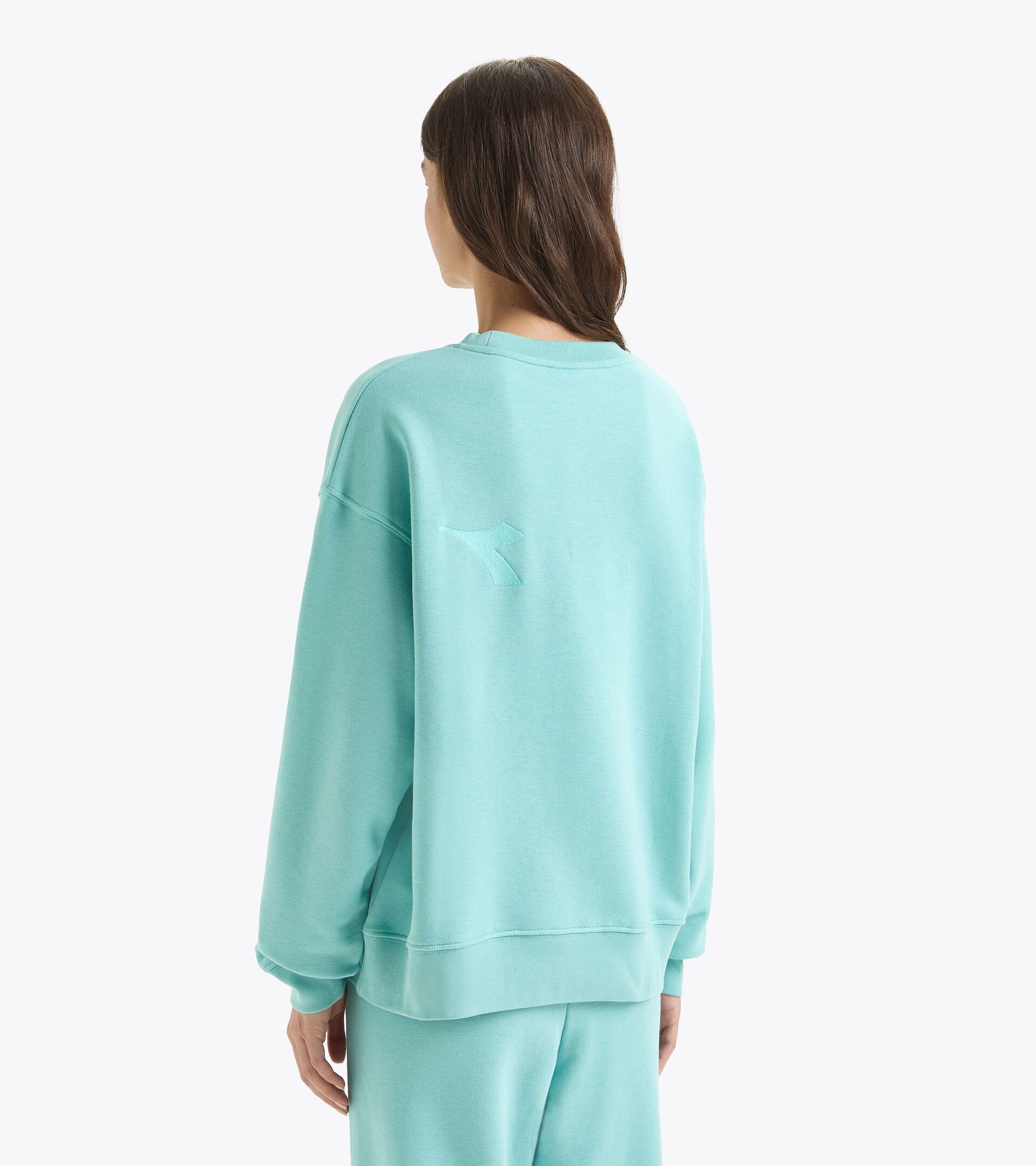 Sweatshirt - Gender Neutral SWEATSHIRT CREW ATHL. LOGO TURQUOISE   (65135) - Diadora