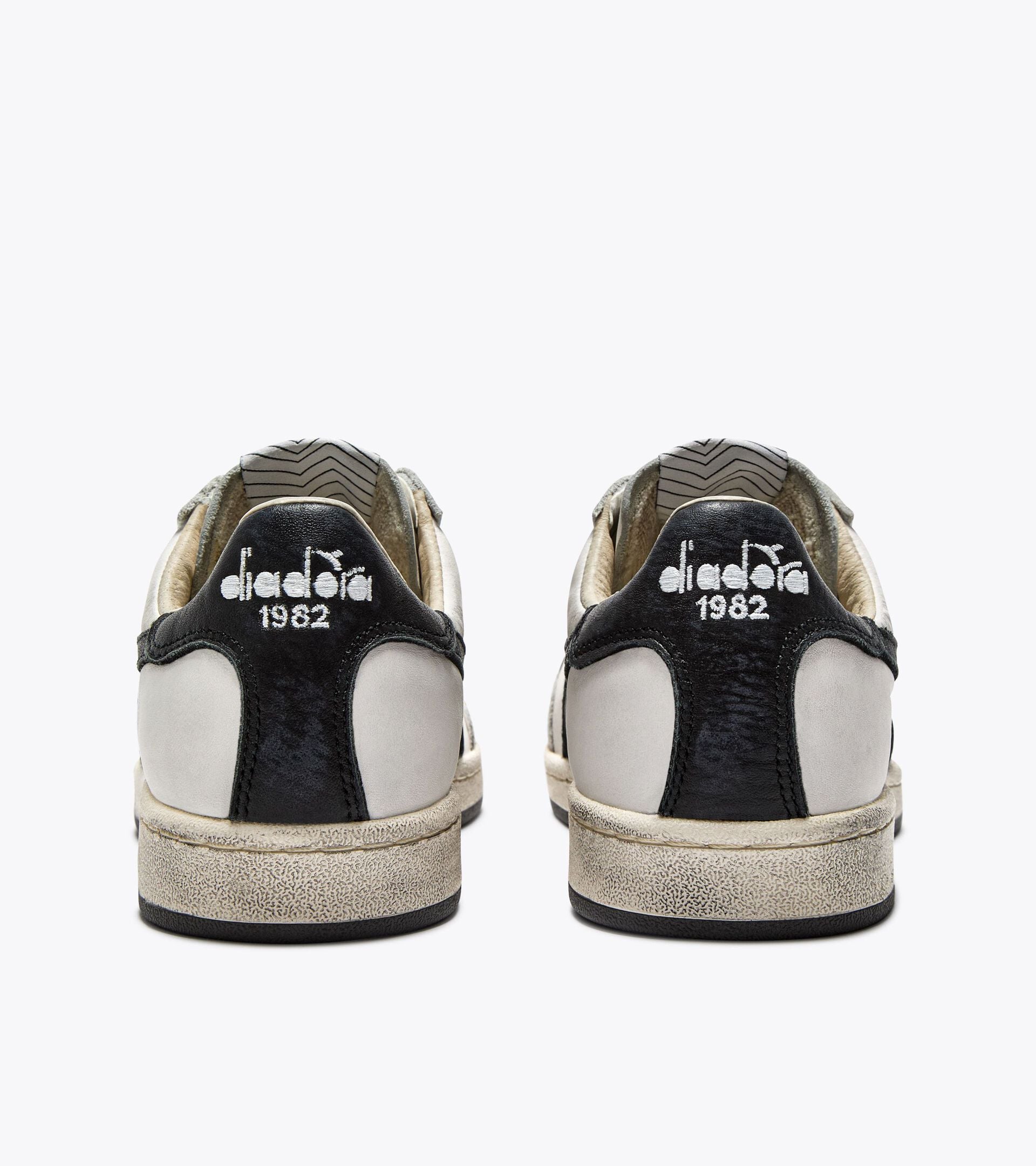 Sneakers Heritage en cuir - Pour tous les genres
 PRESTIGE USED BLANC/NOIR (C0351). - Diadora