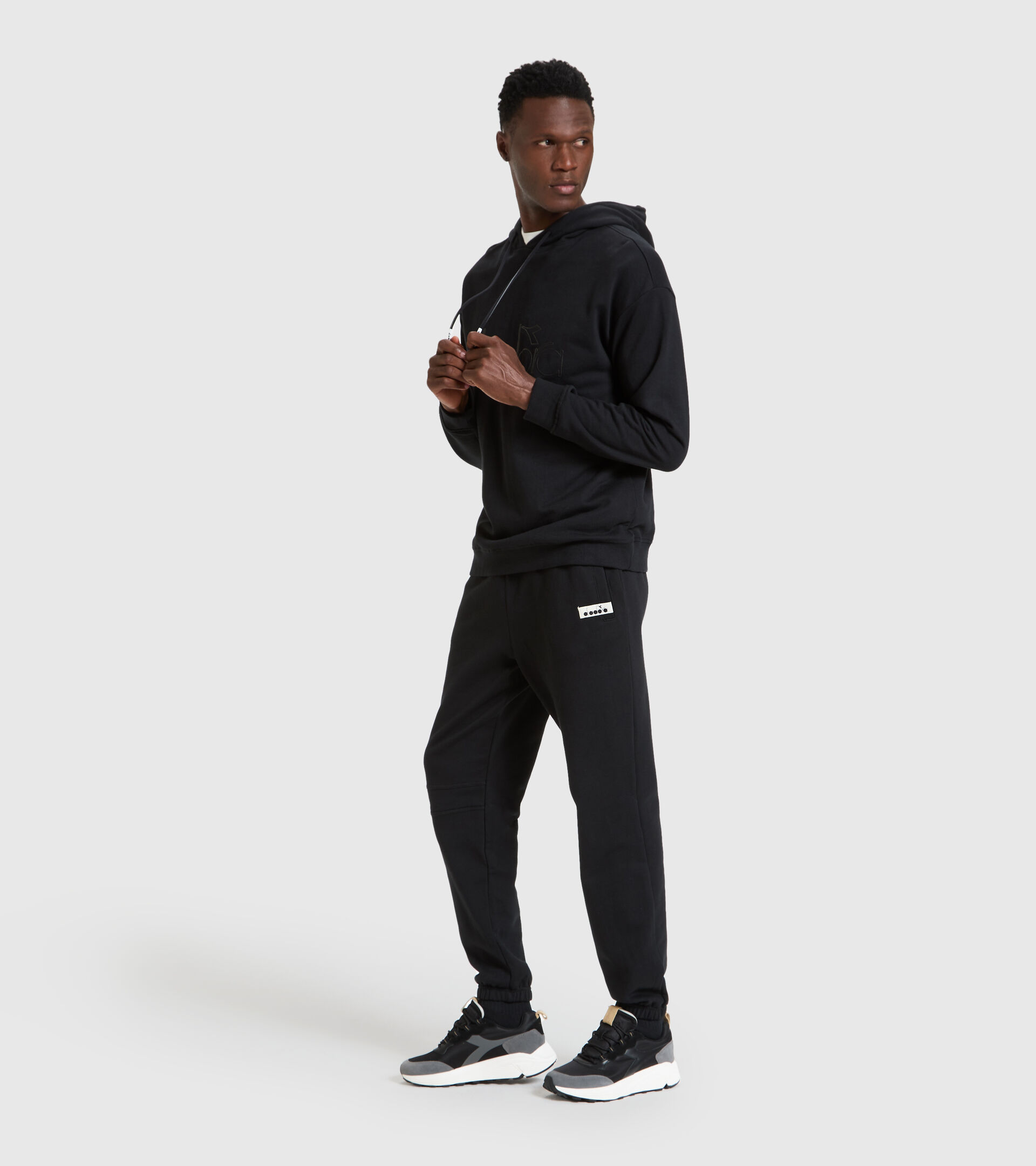Pantalones deportivos - Unisex PANT SQUADRA NEGRO - Diadora