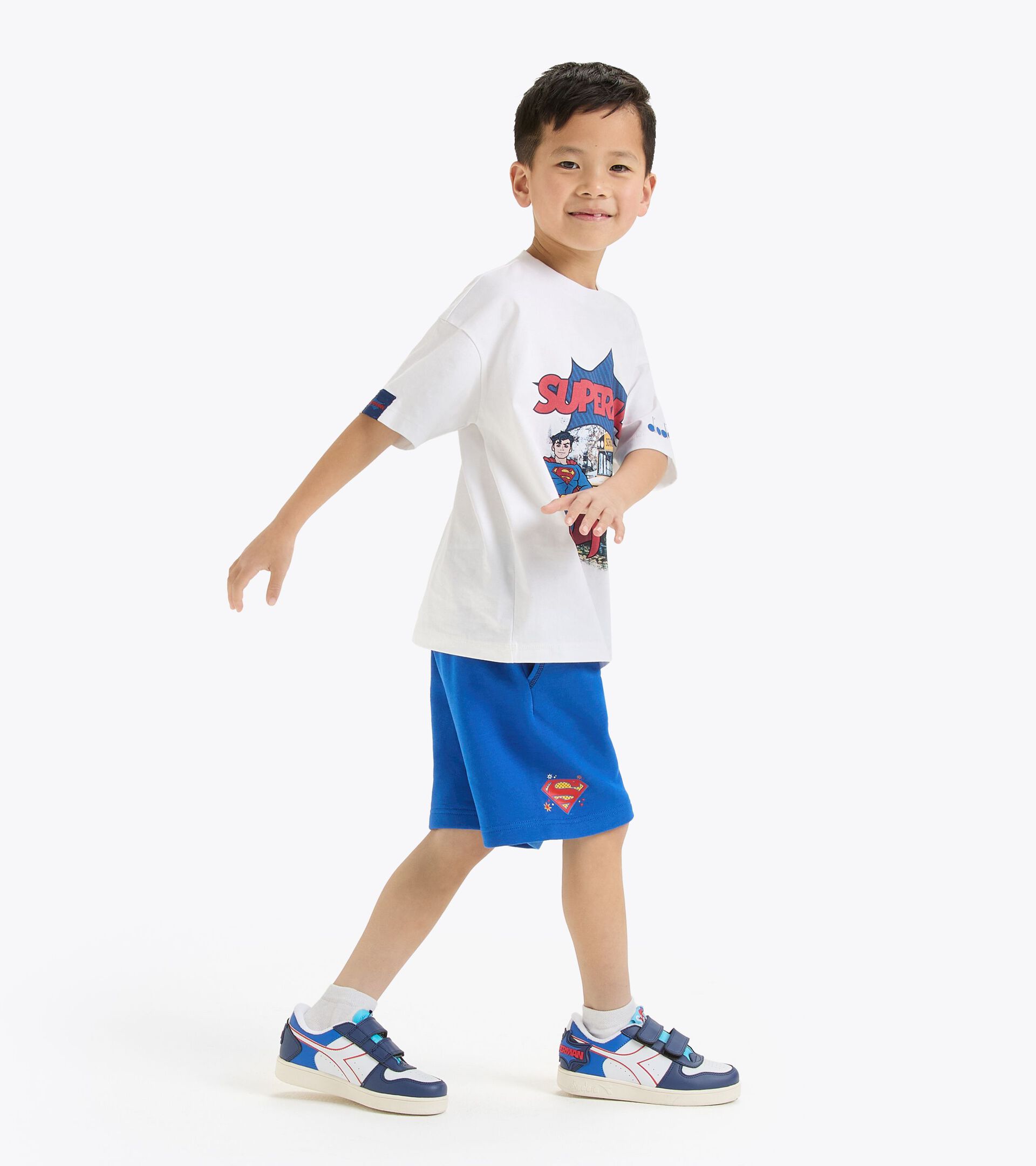 Pantalones cortos superhéroes - Niños y niñas 
 JU.BERMUDA SUPERHEROES AZUL PRINCESA - Diadora