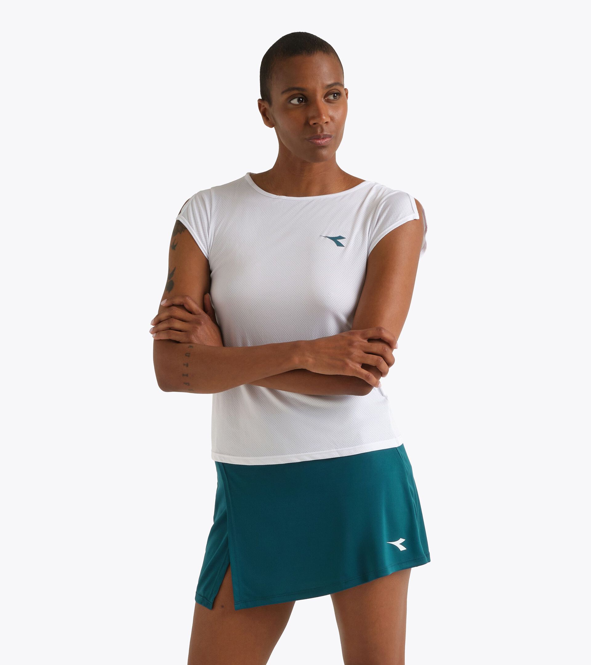 Camiseta de tenis - Mujer
 L. SS T-SHIRT COURT BLANCO VIVO - Diadora