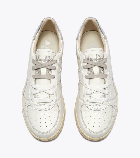 Zapatilla Heritage de piel - Para todos los g&eacute;neros
 B.ELITE X-STITCH WN BLANCO/PLATA  (C6103) - Diadora