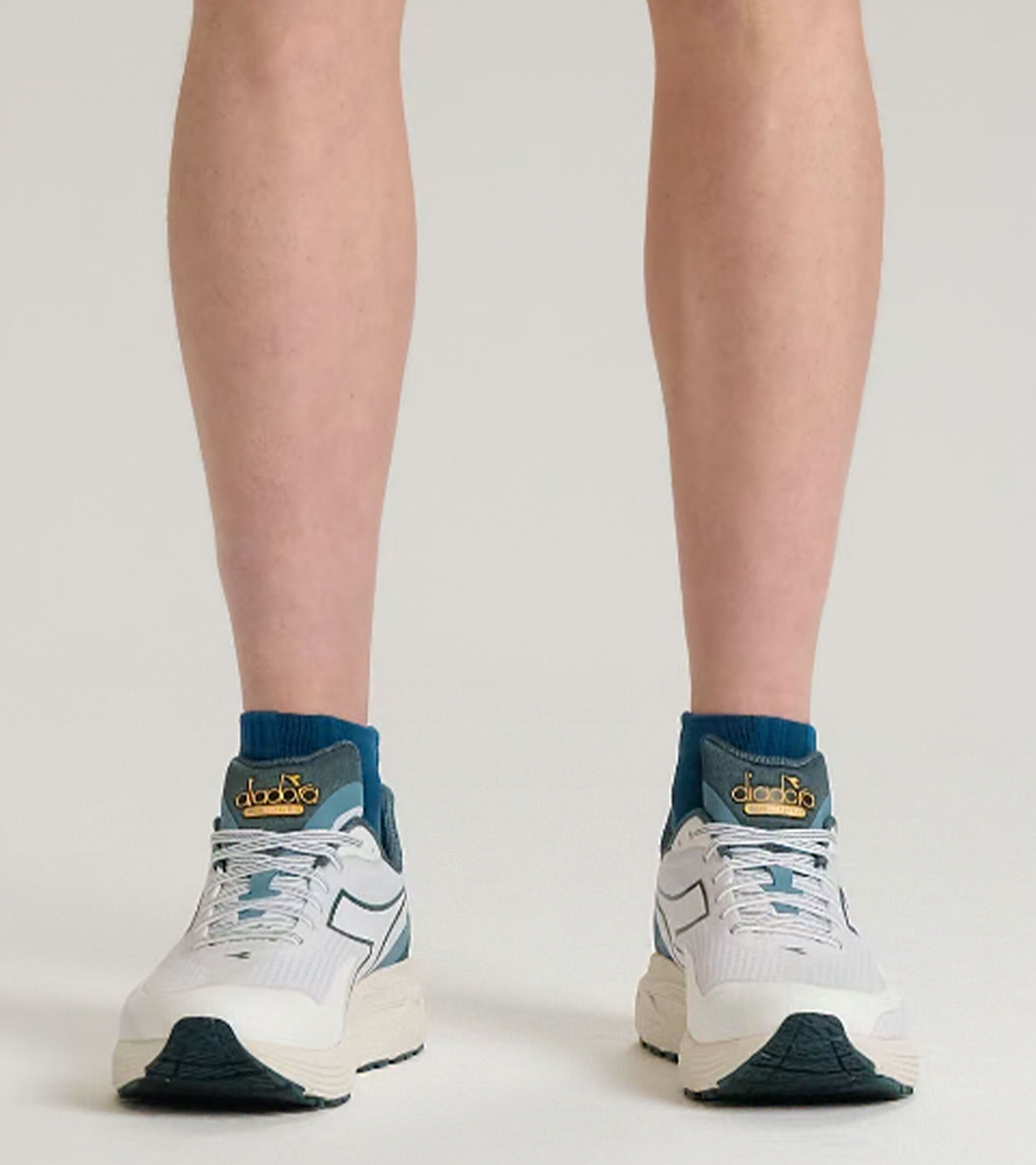 Scarpa da running - Cushioning e protezione - Uomo MYTHOS BLUSHIELD 9 VORTICE BCO/BLU COSTA/BCO SOSPIRO - Diadora