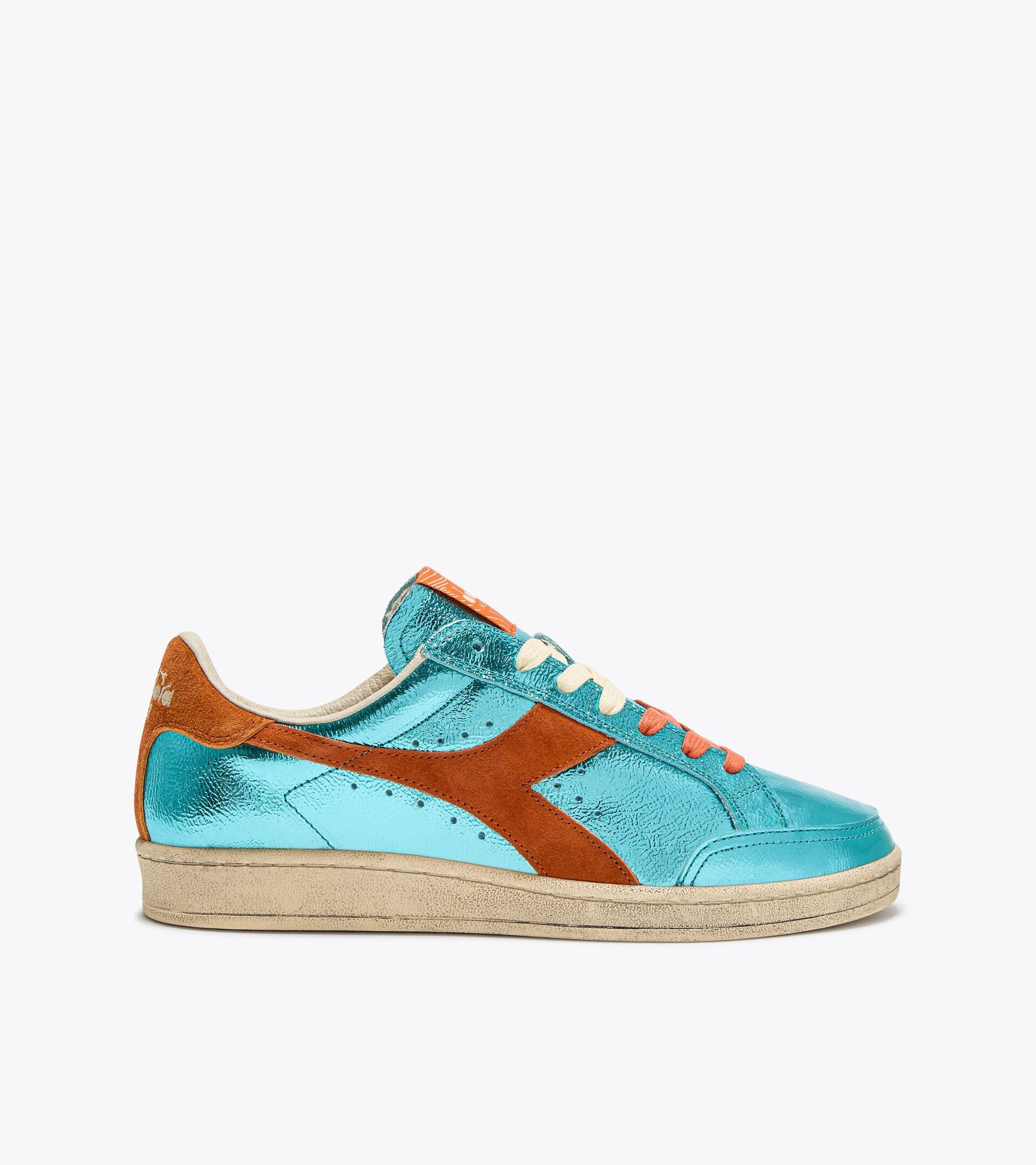 Sneaker Heritage aus metallisiertem Leder - Für alle Geschlechter
 PRESTIGE METAL USED BLAU CURACAO - Diadora