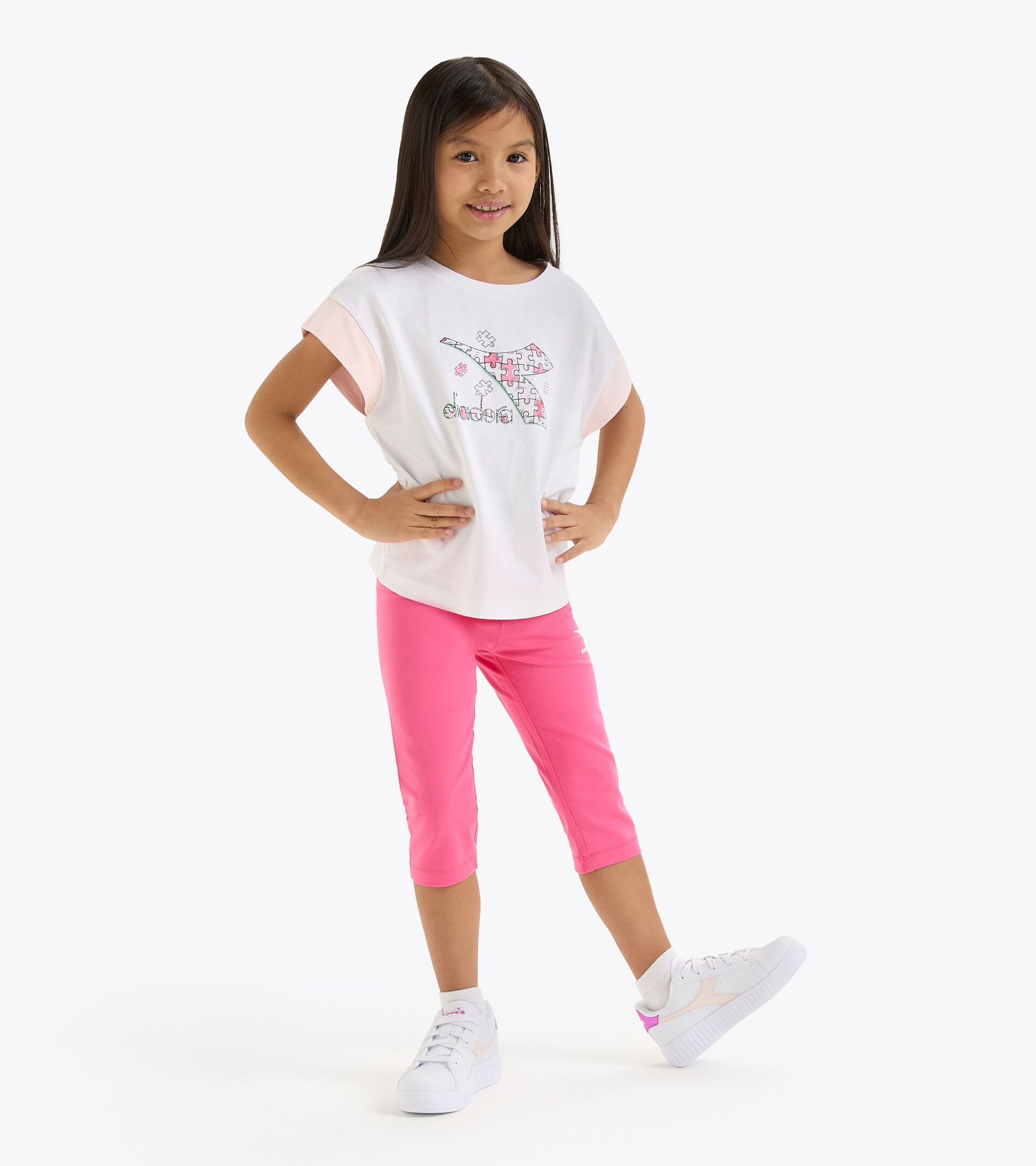 Sports set - T-shirt and leggings - Girl
 JG. SET SS PUZZLES SUPER WHITE/WILD ROSE - Diadora