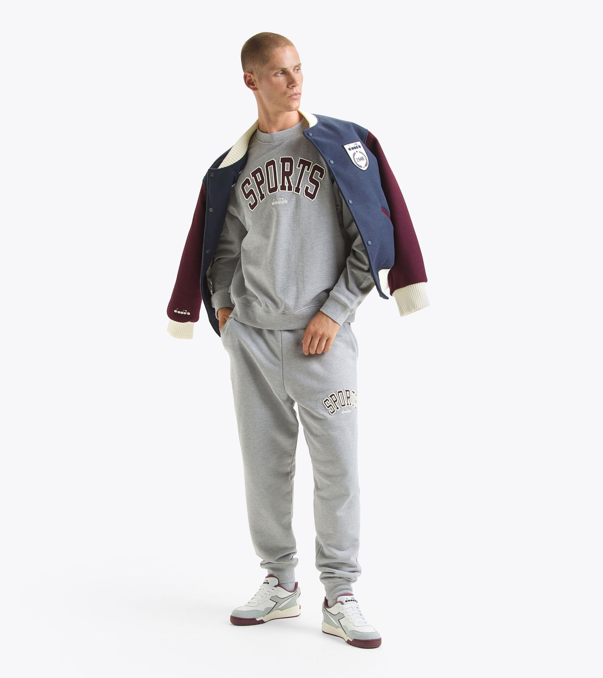 Isolierende Jacke - Made in Italy - Gender Neutral
 JACKET VARSITY LEGACY OCEANA/WINDSOR WEIN/VANILLE EI - Diadora