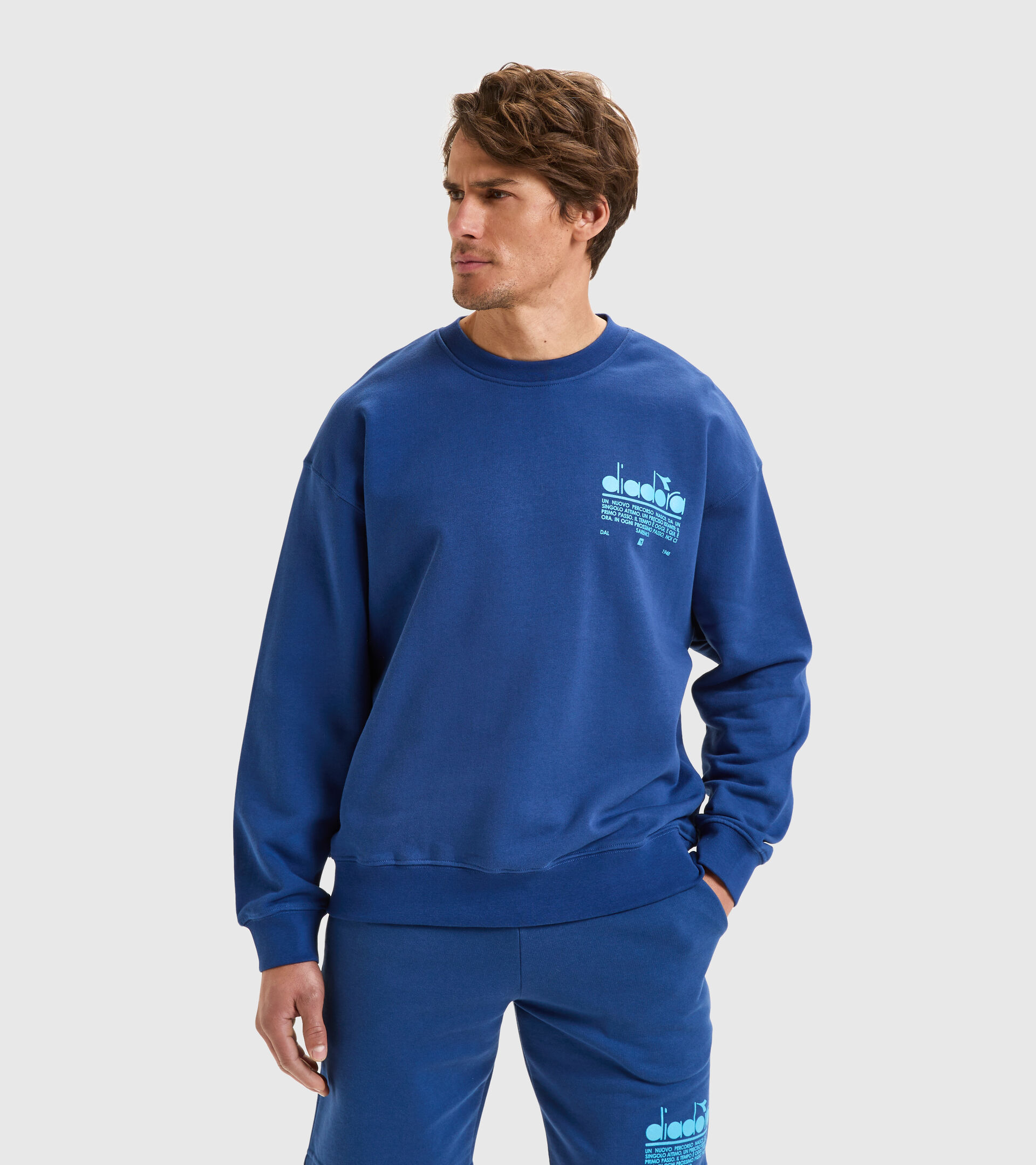 Rundhals-Sweatshirt aus aufgerauter Baumwolle - Unisex SWEATSHIRT CREW MANIFESTO GUTBLAU - Diadora