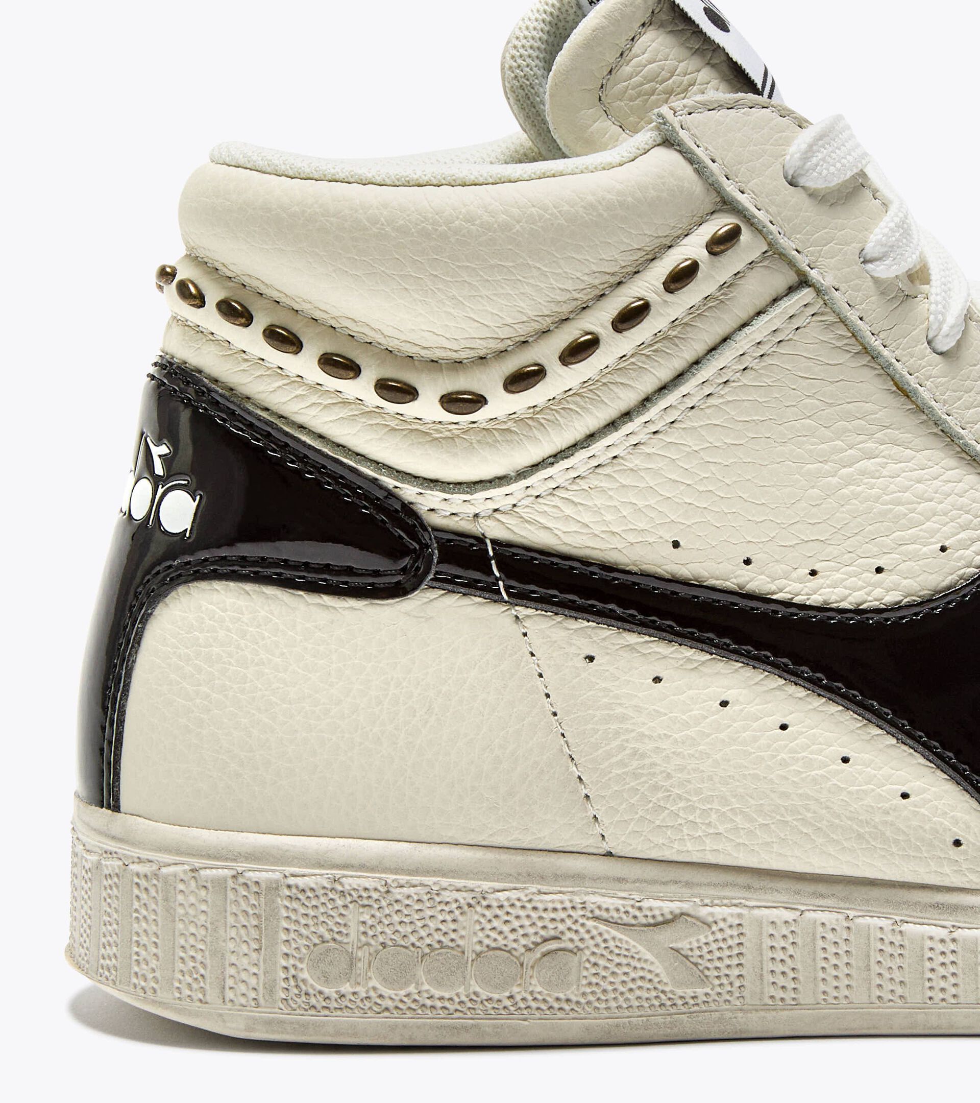 Zapatilla retro-tenis alta - Mujer GAME L HIGH WAXED STUDS WN BLANCO/NEGRO - Diadora
