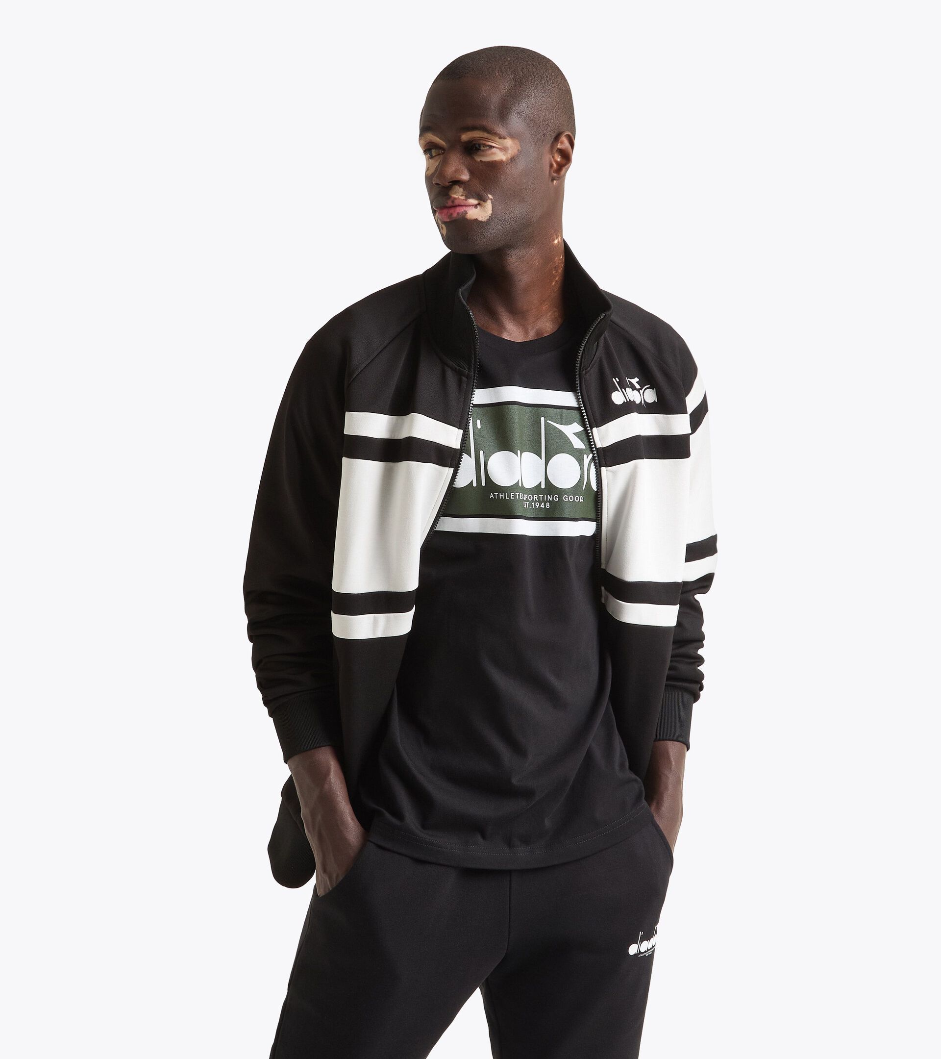 Chaqueta deportiva inspirada en los 80 - Para todos los géneros JACKET 80S BLANCO VIVO/NEGRO - Diadora
