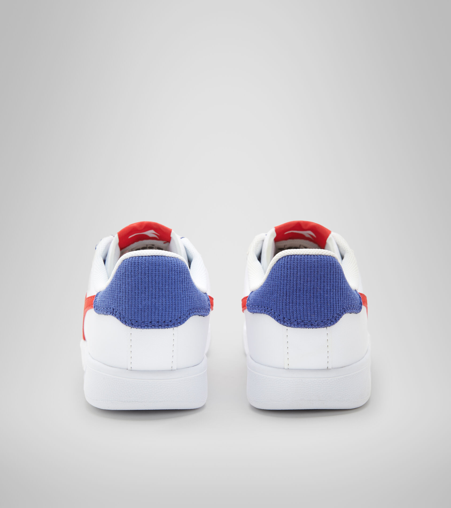 Sports shoes - Youth 8-16 years GAME P ACE GS WHITE/MOLTEN LAVA - Diadora