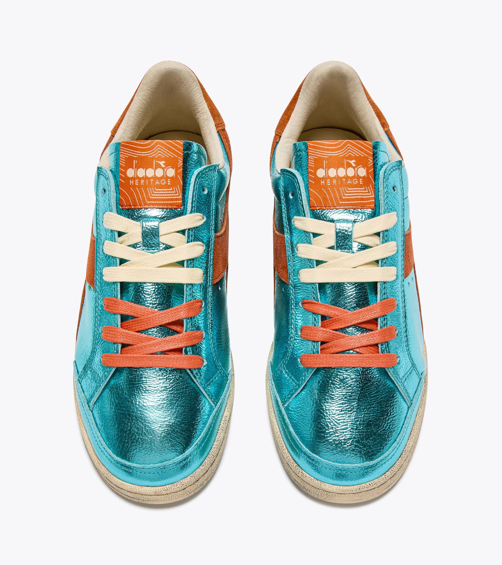 Sneaker Heritage aus metallisiertem Leder - Für alle Geschlechter
 PRESTIGE METAL USED BLAU CURACAO - Diadora