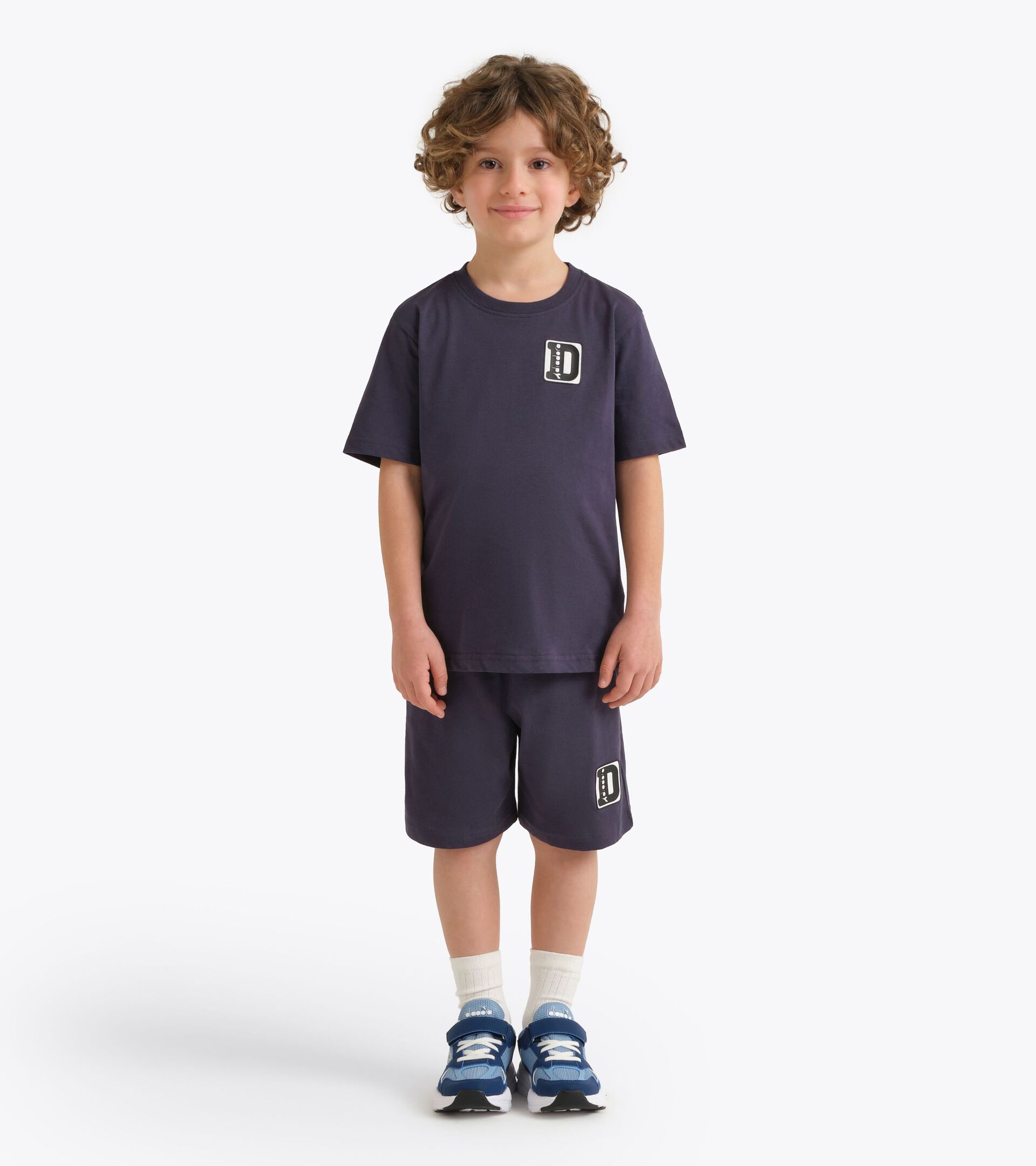 Conjunto deportivo - Camiseta y pantal&oacute;n corto - Ni&ntilde;o
 JB. SET ESS. SPORTS II SS AZUL NOCHE - Diadora