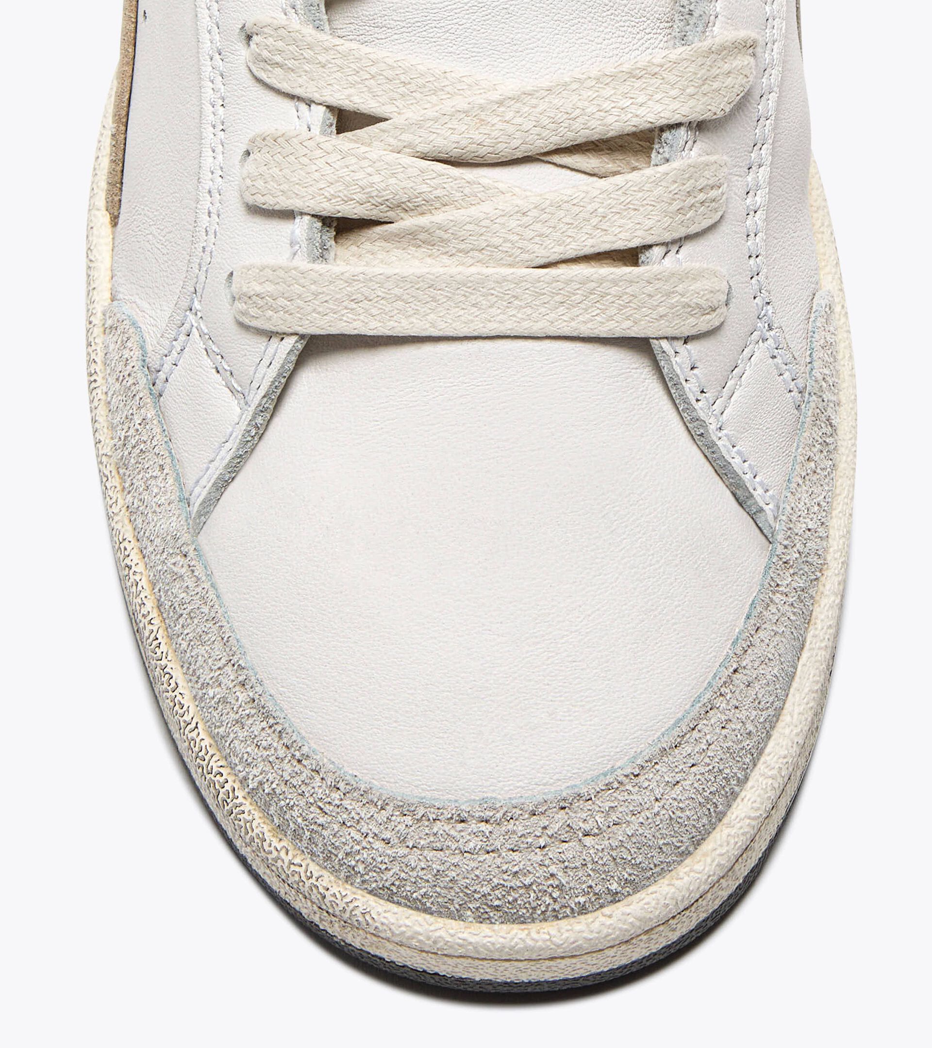 Zapatilla Heritage de piel - Para todos los géneros
 PRESTIGE USED BLANCO/RAYO DE LUNA - Diadora