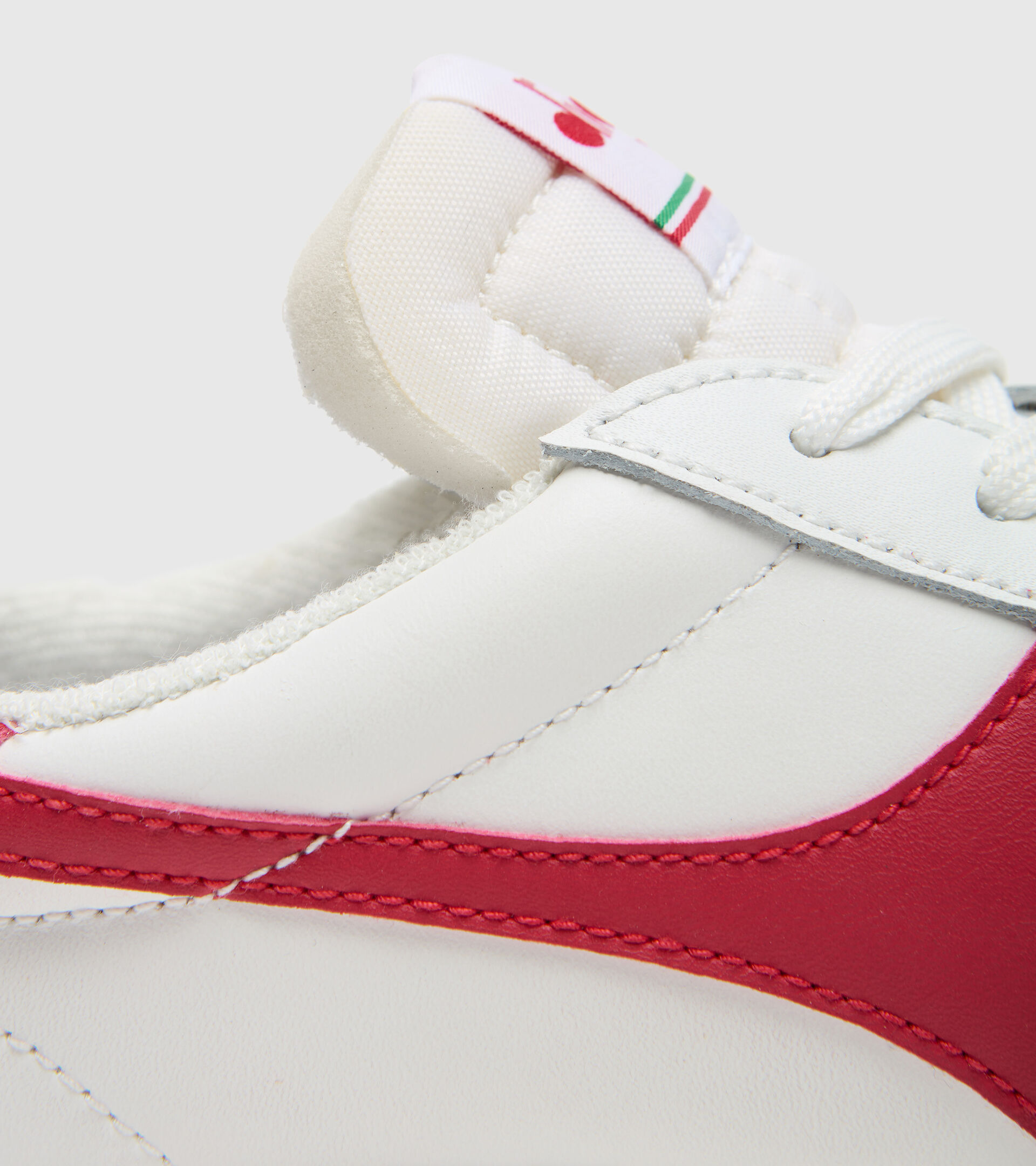 Zapatilla deportiva - Unisex MELODY LEATHER DIRTY BIANCO/ROSSO TANGO - Diadora