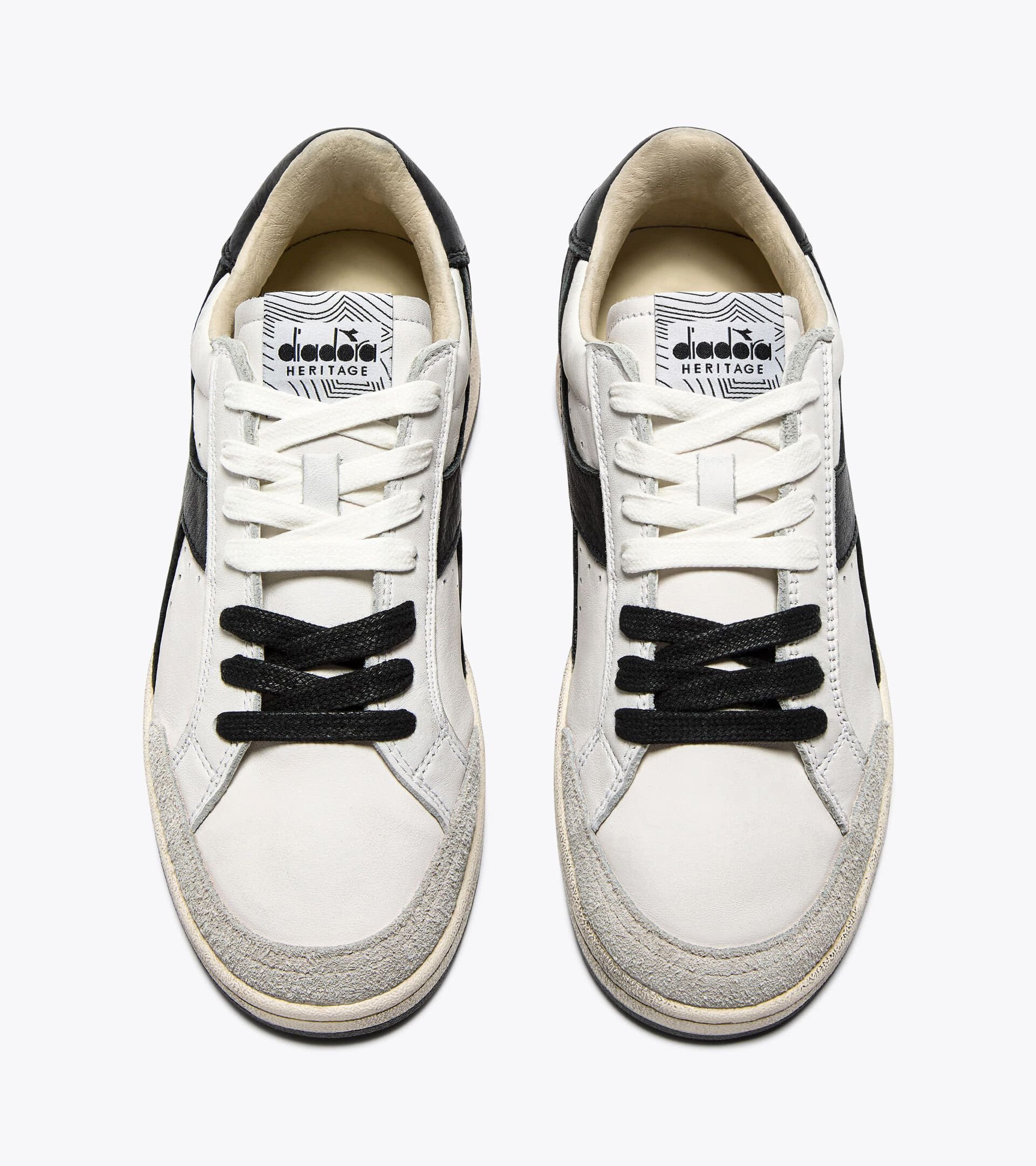 Zapatilla Heritage de piel - Para todos los géneros
 PRESTIGE USED BLANCO/NEGRO - Diadora