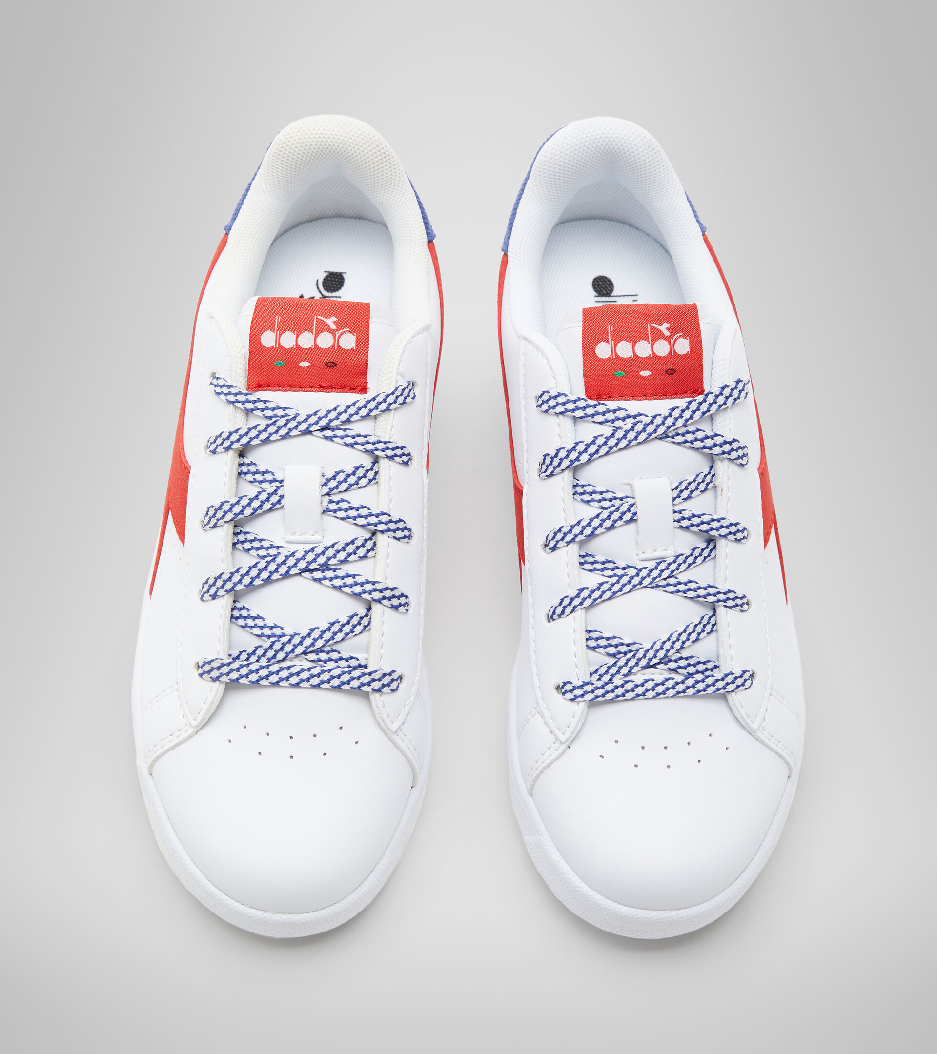 Sports shoes - Youth 8-16 years GAME P ACE GS WHITE/MOLTEN LAVA - Diadora