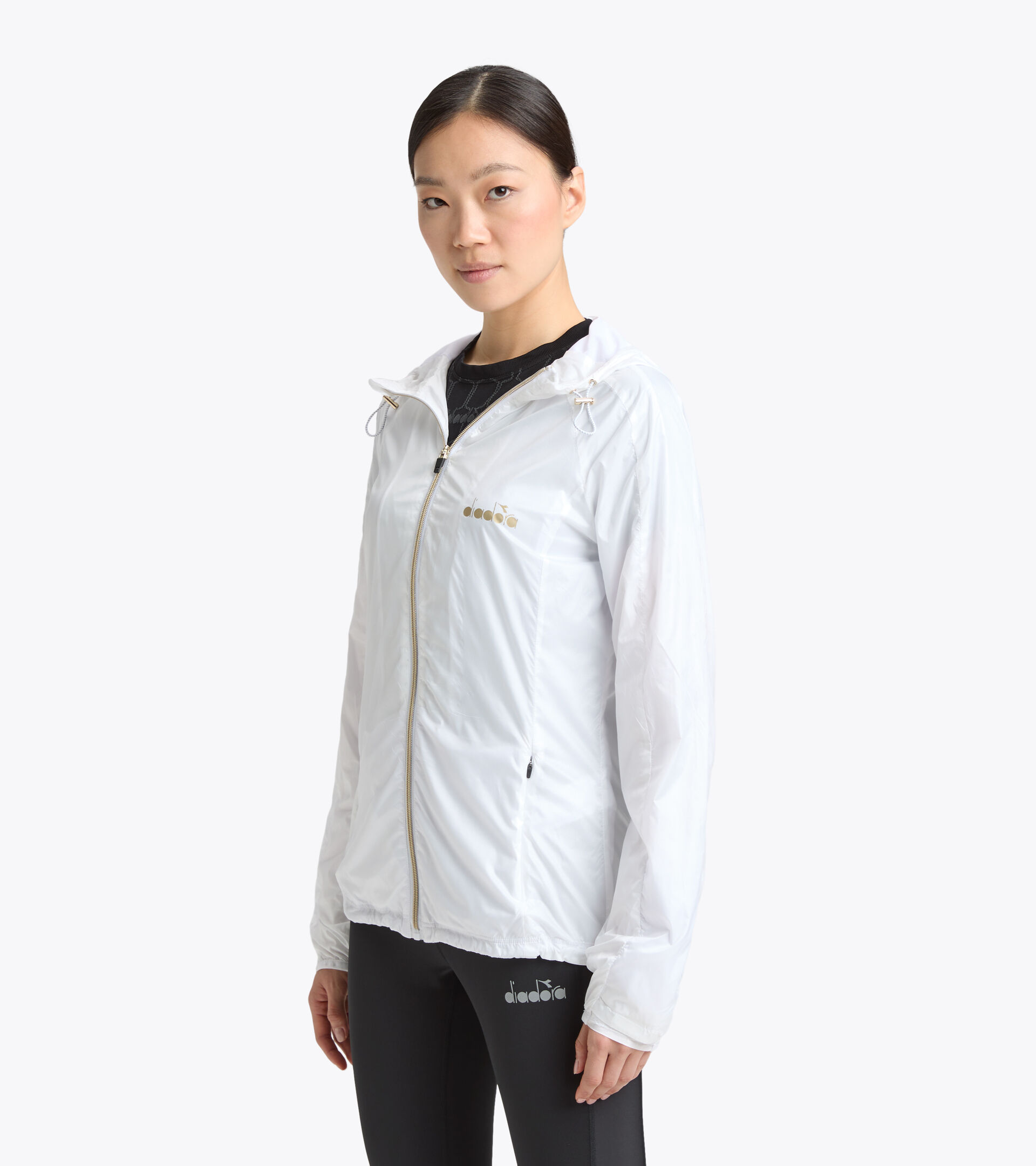 Chaqueta cortavientos de running - Mujer L. JACKET GOLD BLANCO VIVO - Diadora