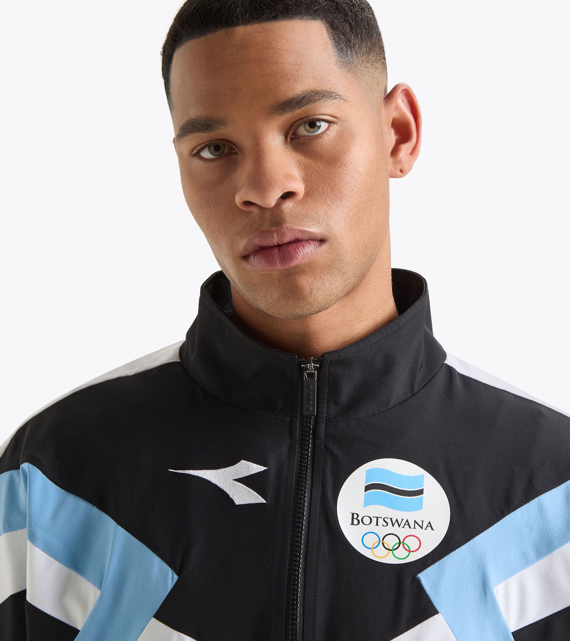 Track Jacket  - All-Gender TRACK JACKET PODIUM BOTSWANA LOGO BOTSWANA FLAG BLUE - Diadora