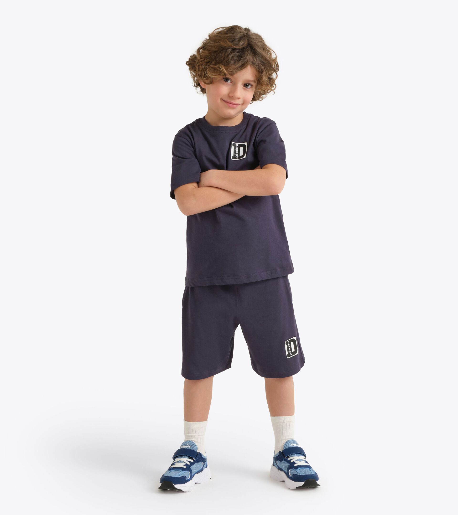 Conjunto deportivo - Camiseta y pantal&oacute;n corto - Ni&ntilde;o
 JB. SET ESS. SPORTS II SS AZUL NOCHE - Diadora