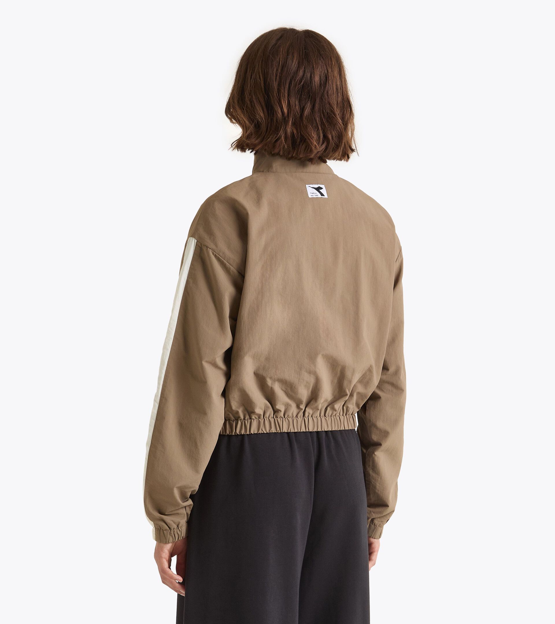 Track Jacket - Mujer
 L. TRACK JACKET ATHL. LOGO TINTE SEPIA - Diadora
